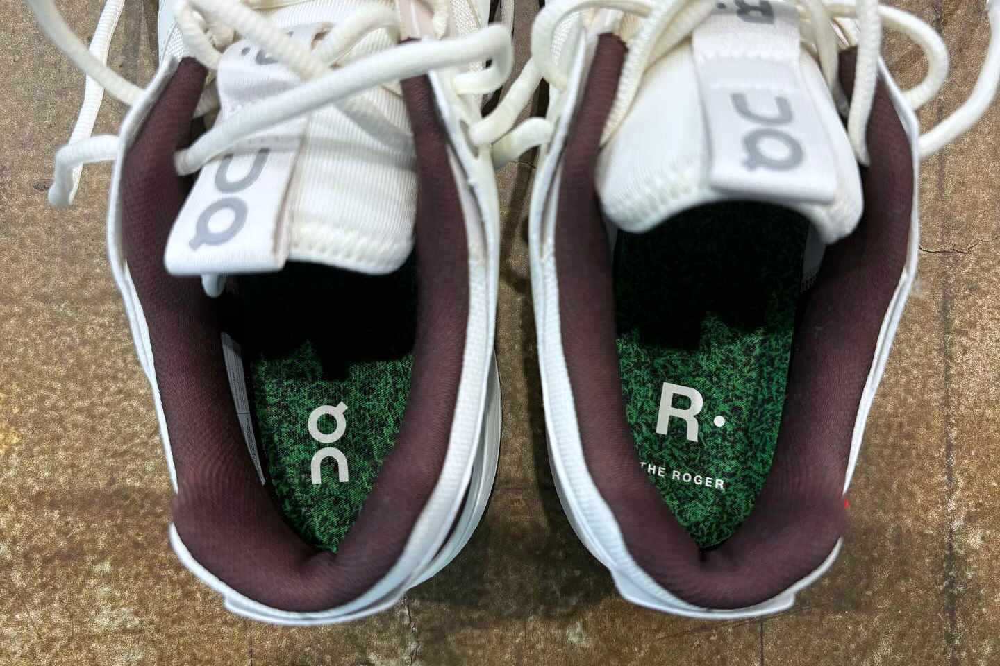 Roger Federer's On ROGER tennis sneaker in white and black with grass insole designed by atmos Japan