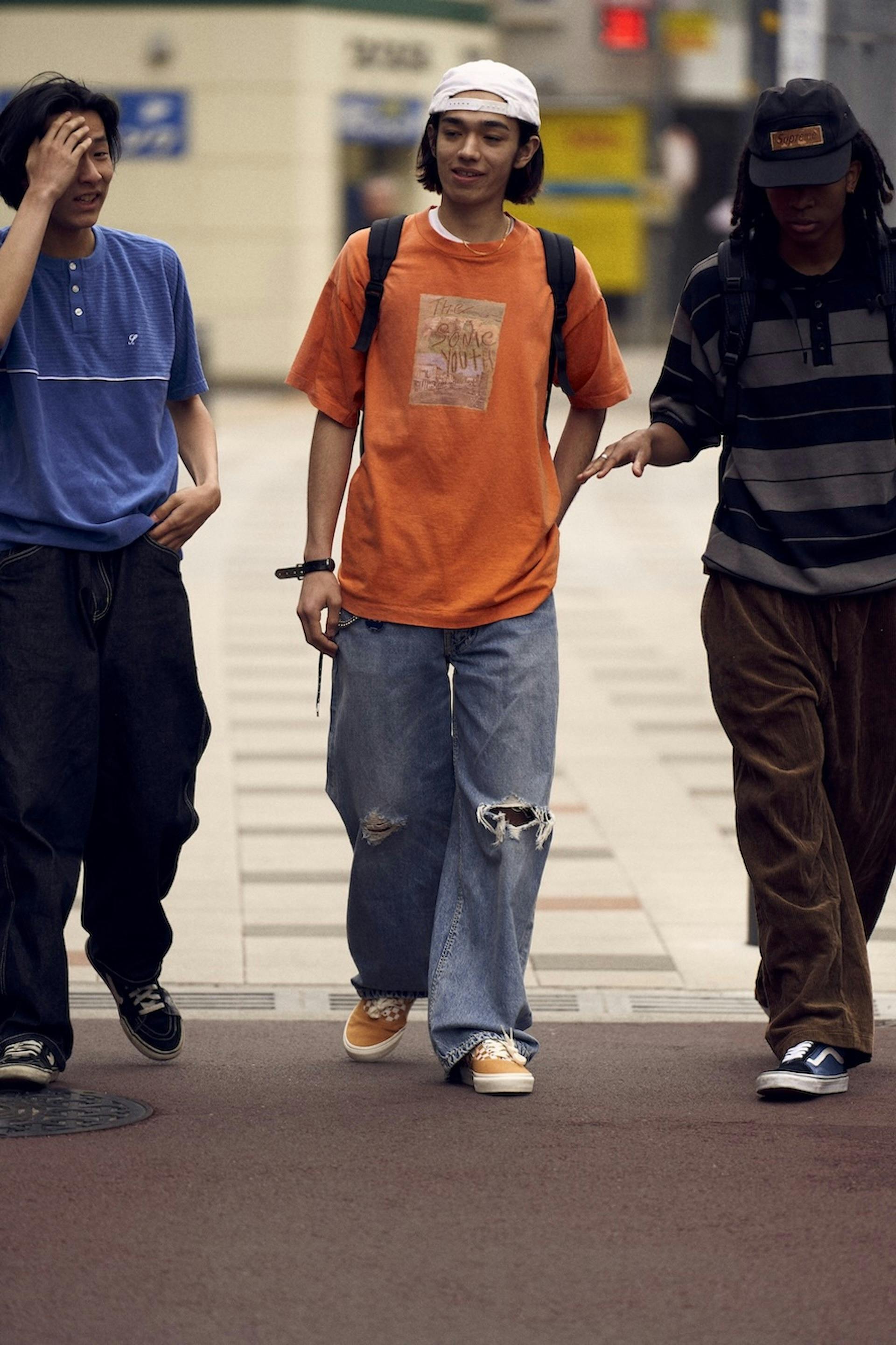 Vans' Erap sneaker that combines the Era and Slip-On sneakers in blue, black, and yellow checkerboard