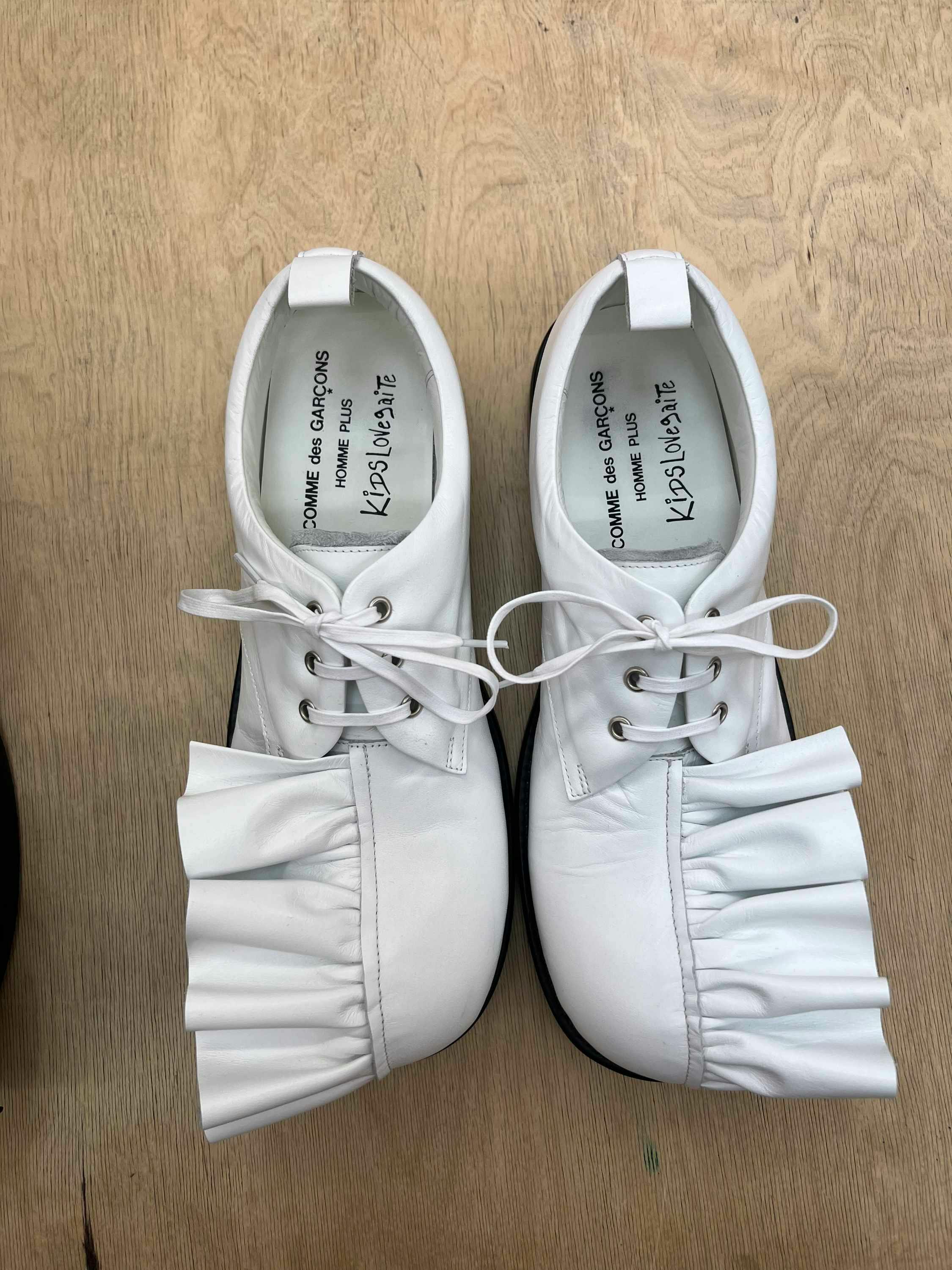 Nike & Comme des Garcons Homme Plus Spring/Summer 2025 sneaker collaboration in pink, white and blue