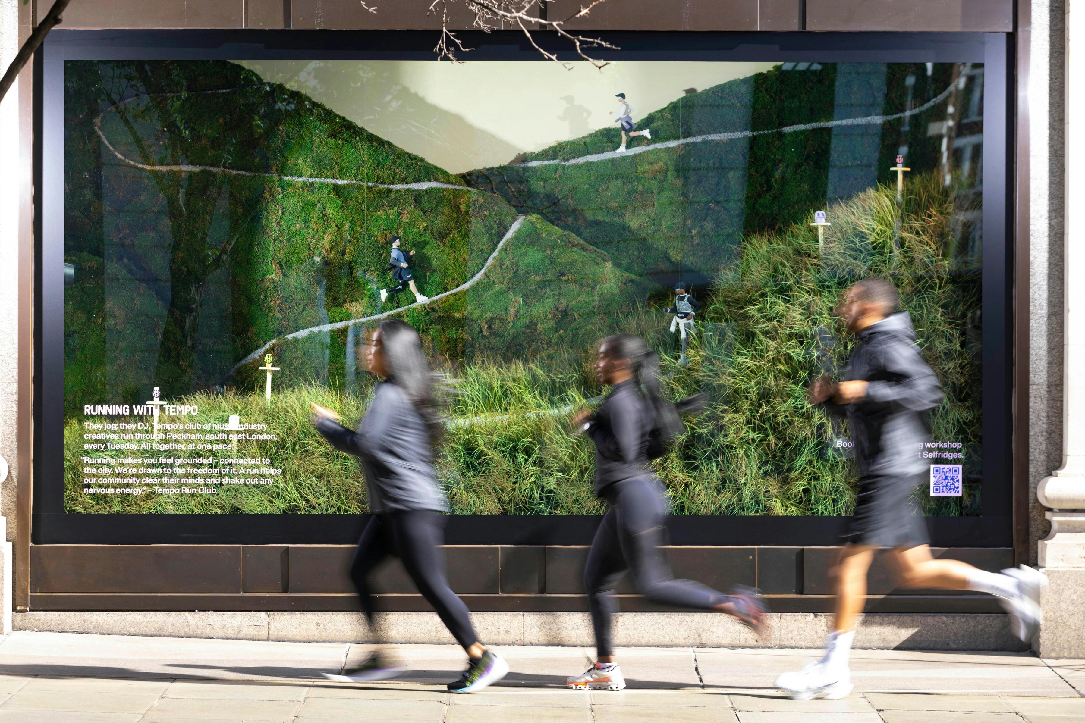 Group running in front of Selfridges