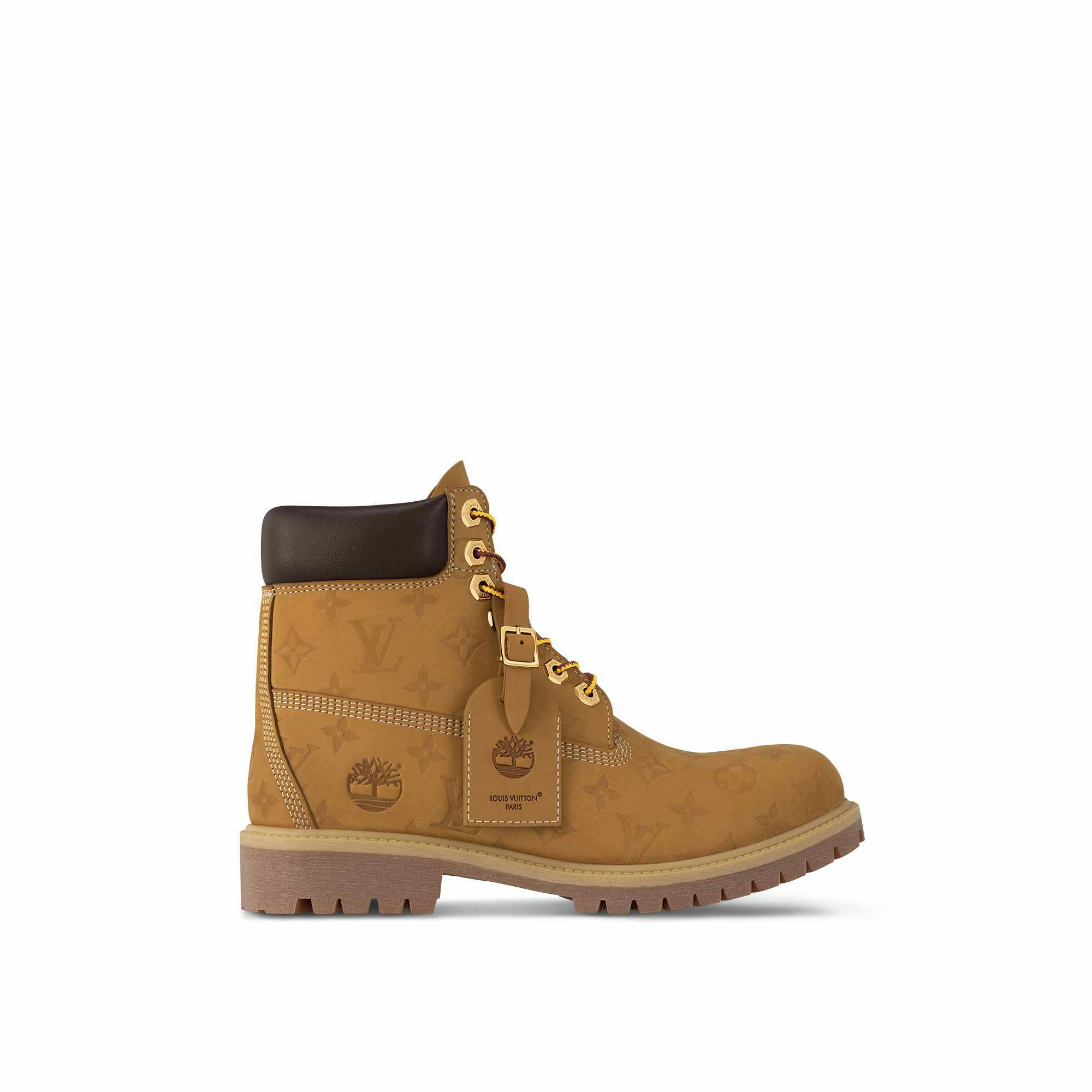 Louis Vuitton's Timberland boot collab revealed by Pharrell Williams, including beige and black 6" leather boots and ranger-style pull ons in Louis Vuitton-monogrammed boxes