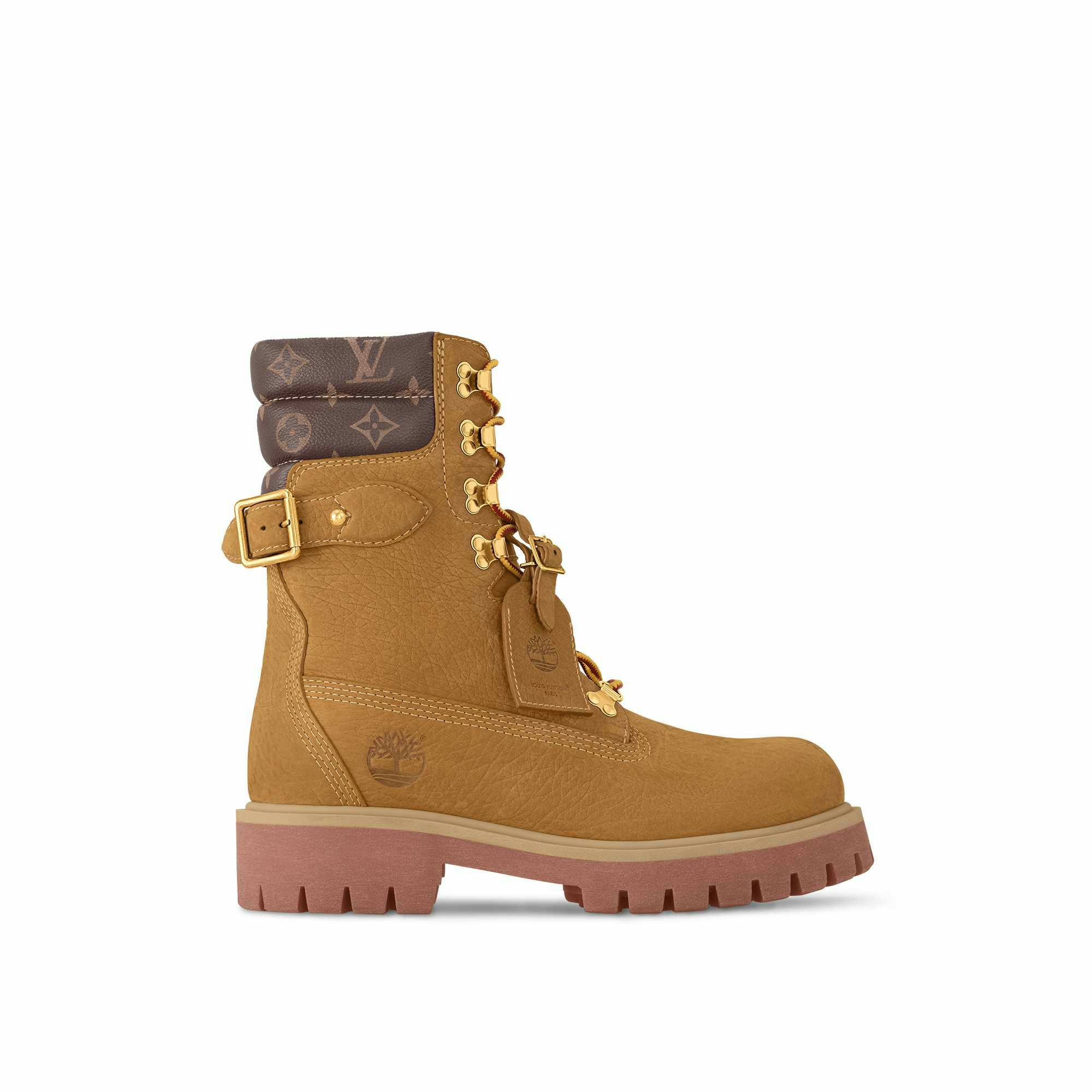 Louis Vuitton's Timberland boot collab revealed by Pharrell Williams, including beige and black 6" leather boots and ranger-style pull ons in Louis Vuitton-monogrammed boxes