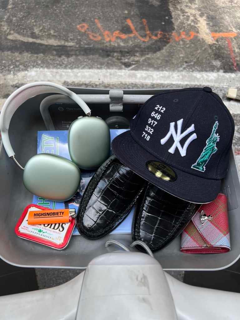Citibike baskets accessorized with magazines, shoes, sunglasses