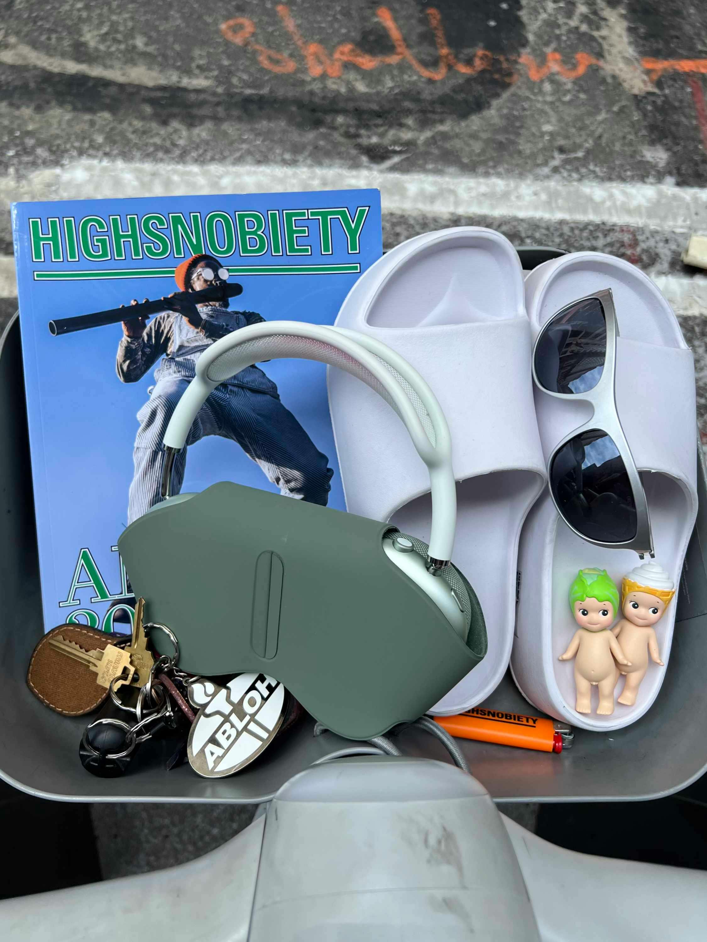 Citibike baskets accessorized with magazines, shoes, sunglasses
