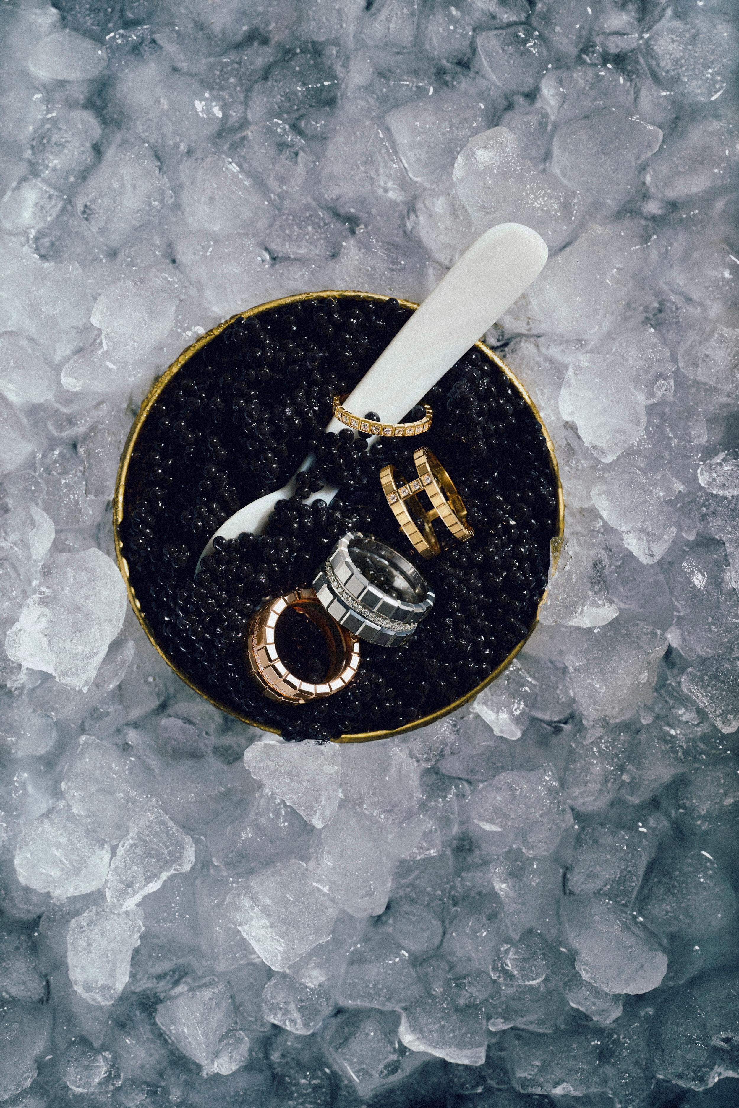 Chopard Ice Cube Collection photographed with a luxurious spread of seafood