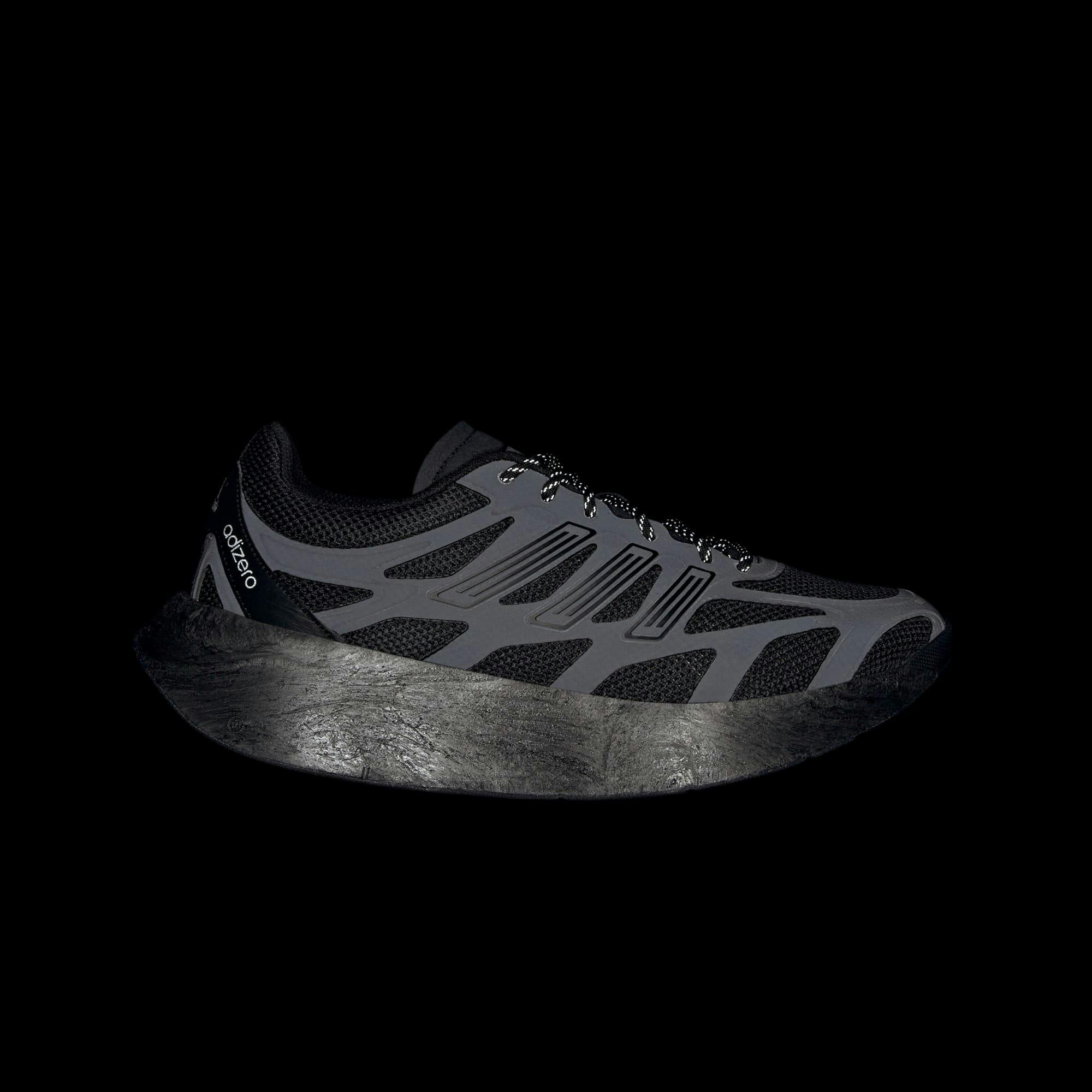 adidas aruku sneaker in black and white reflective colorways