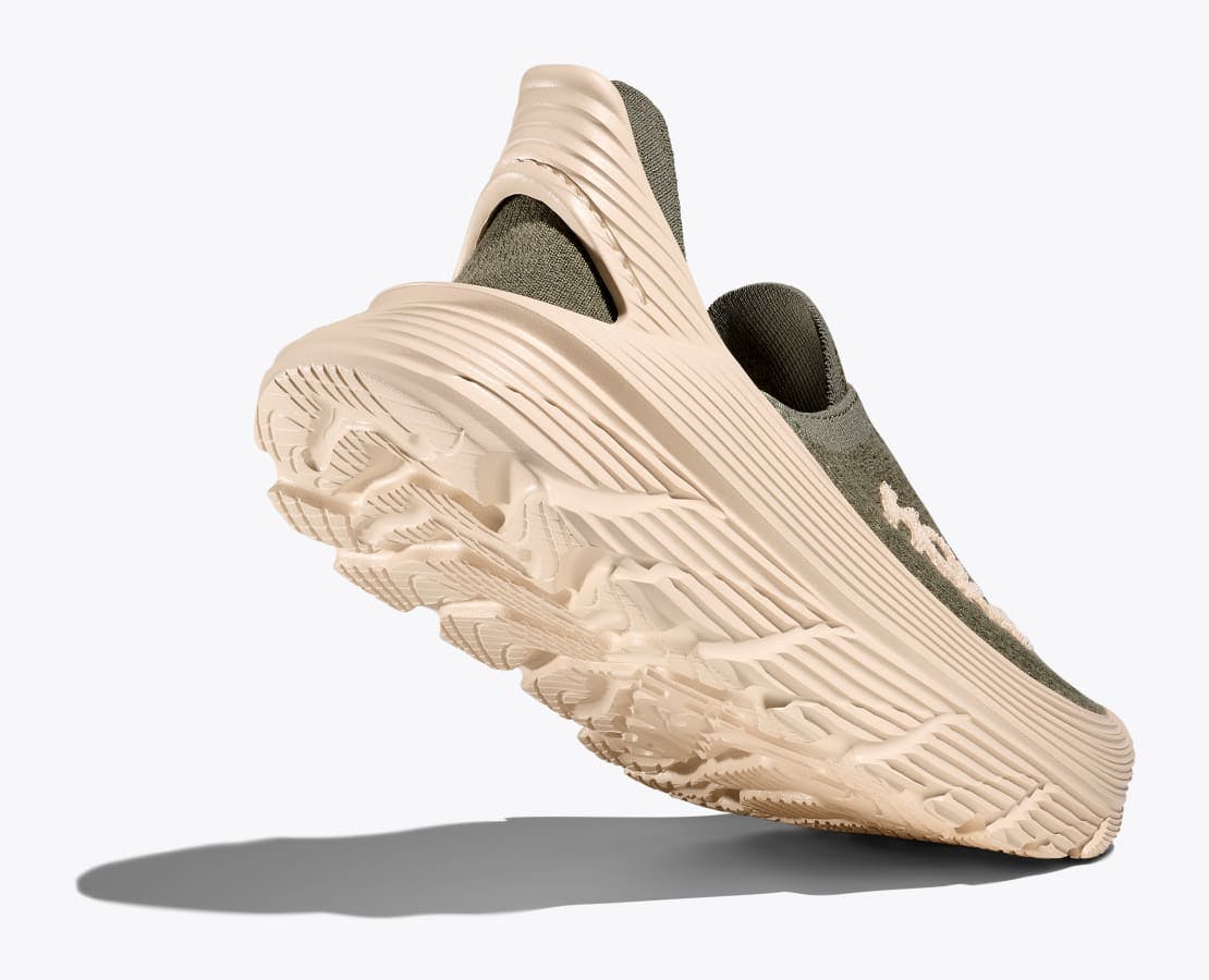 green HOKA Restore slip-om