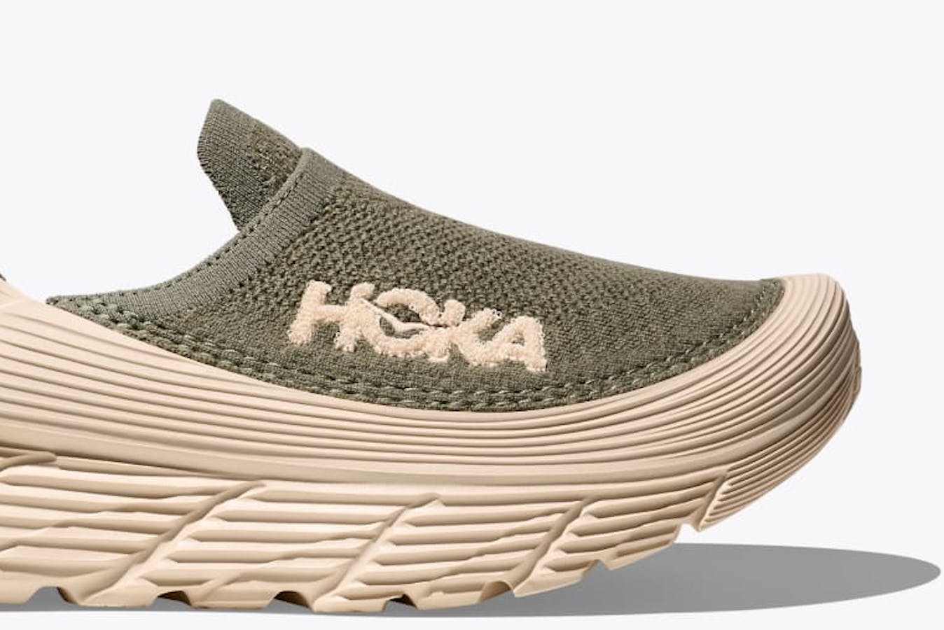 green HOKA Restore slip-om
