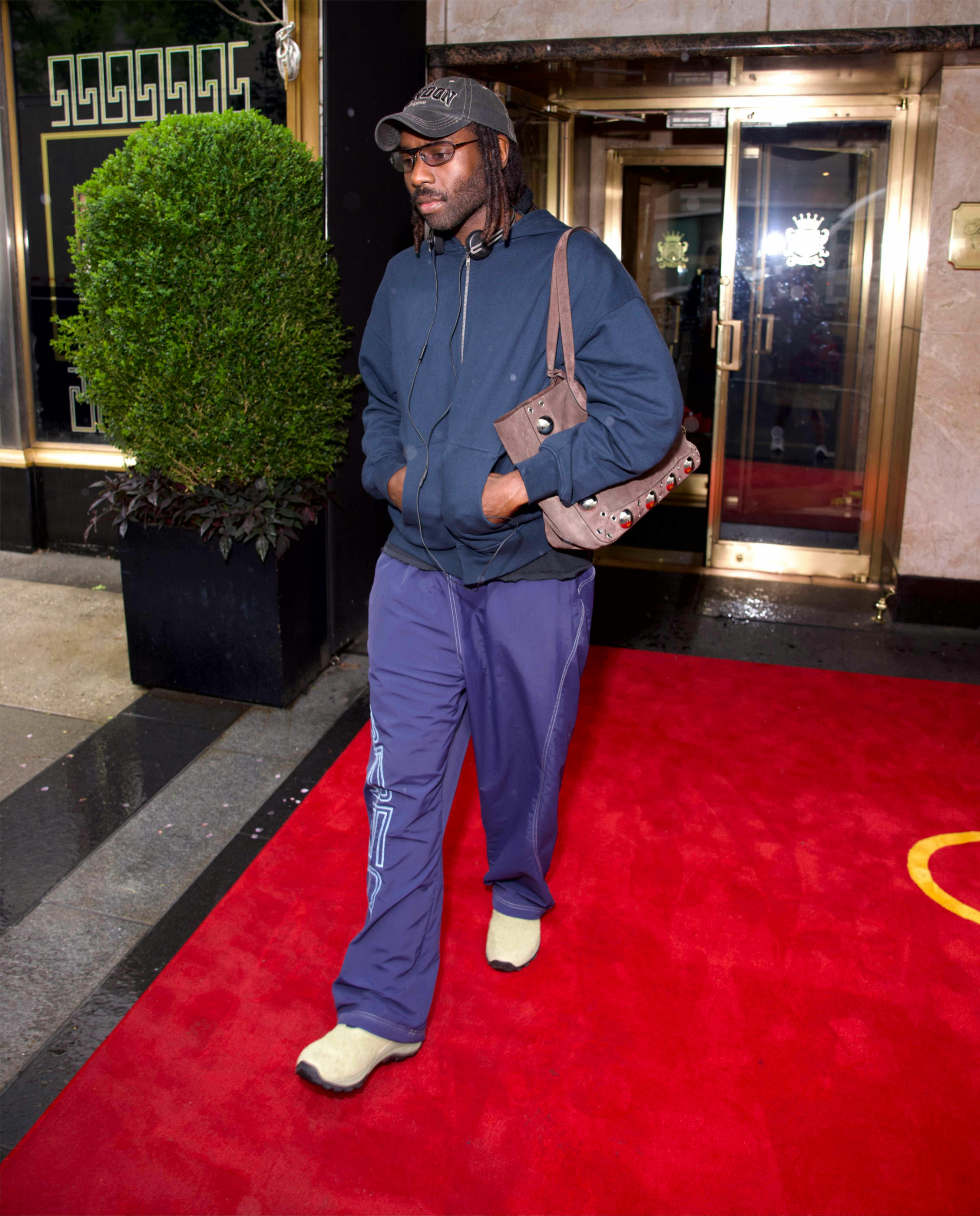 dev hynes in merrell jungle moc
