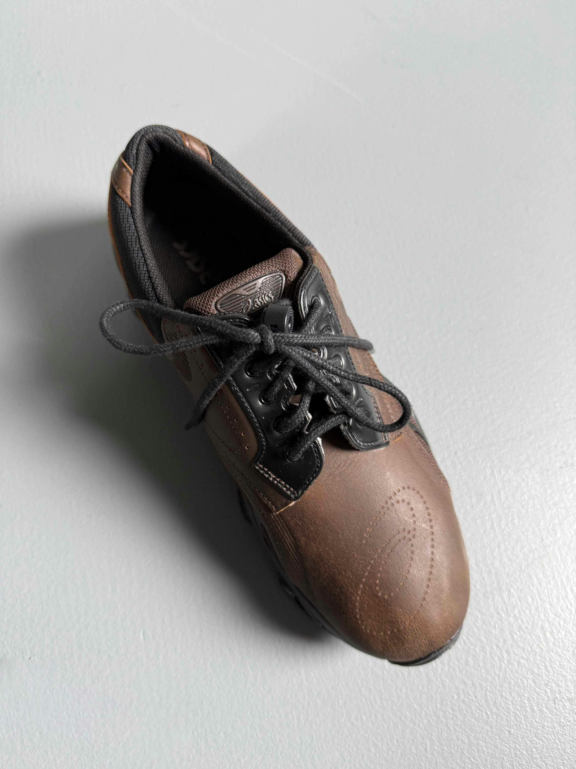 asics first leather gel sneaker sportswear in black and brown