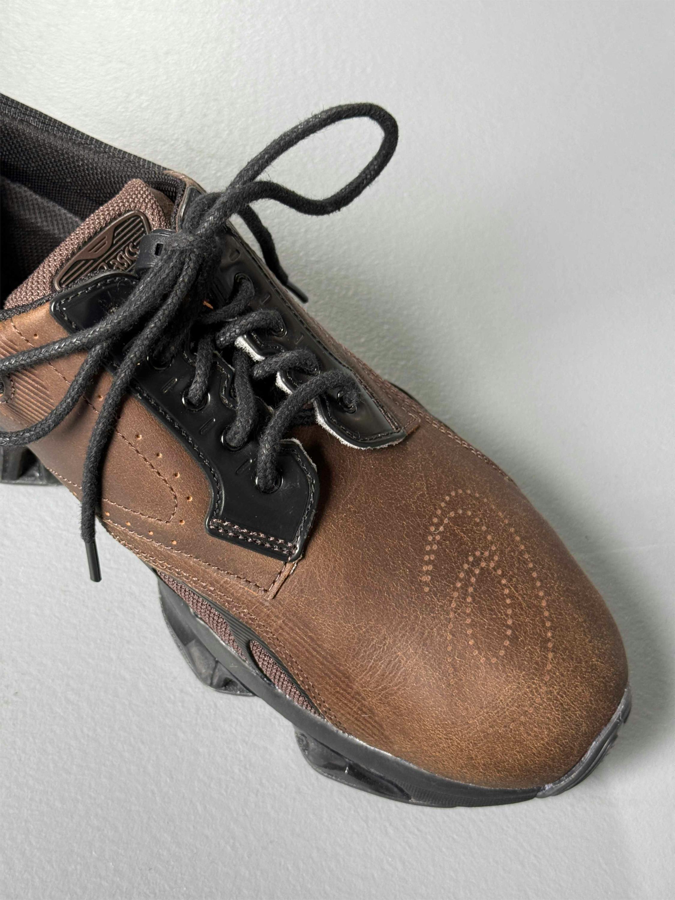 asics first leather gel sneaker sportswear in black and brown