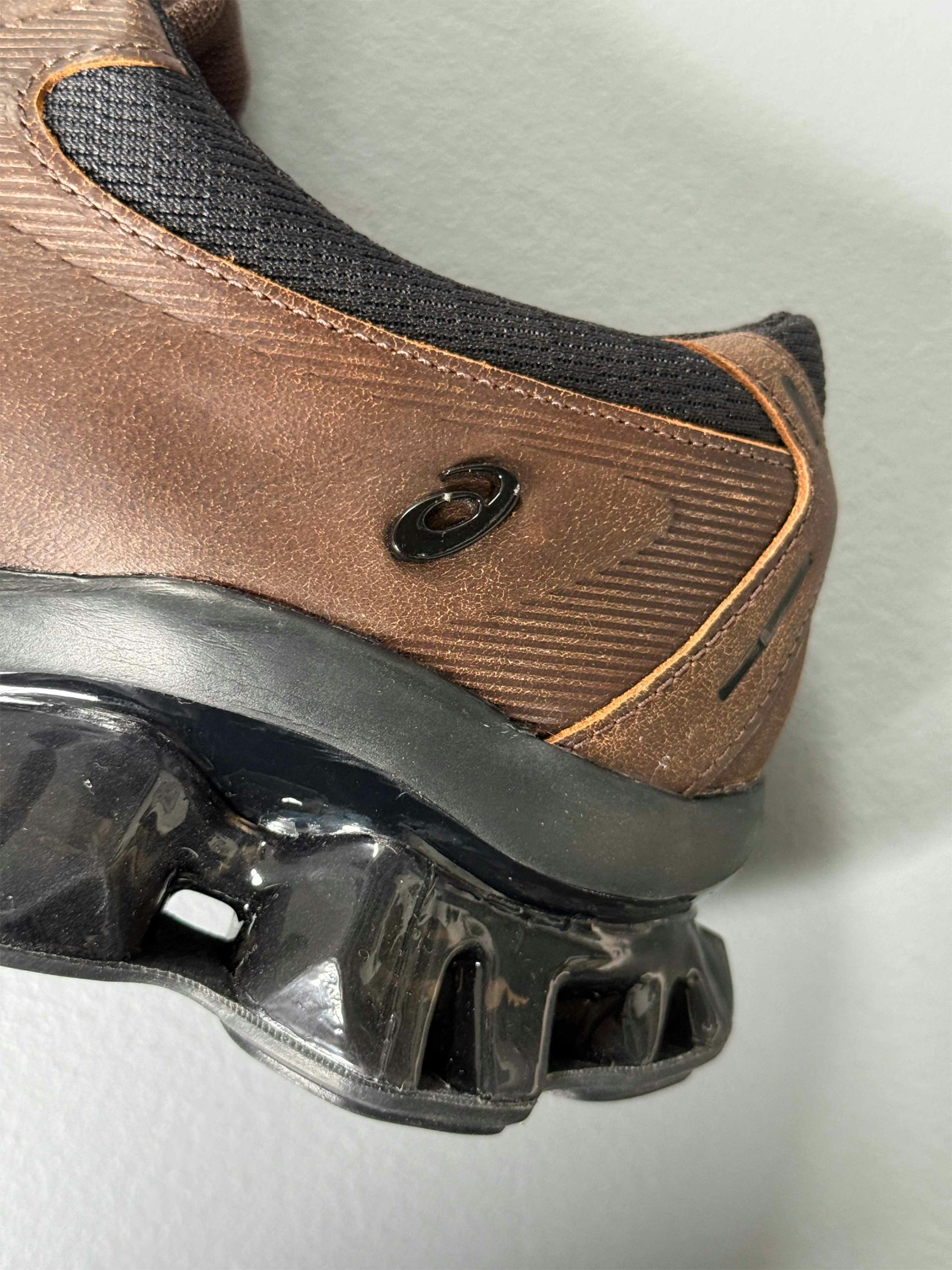 asics first leather gel sneaker sportswear in black and brown