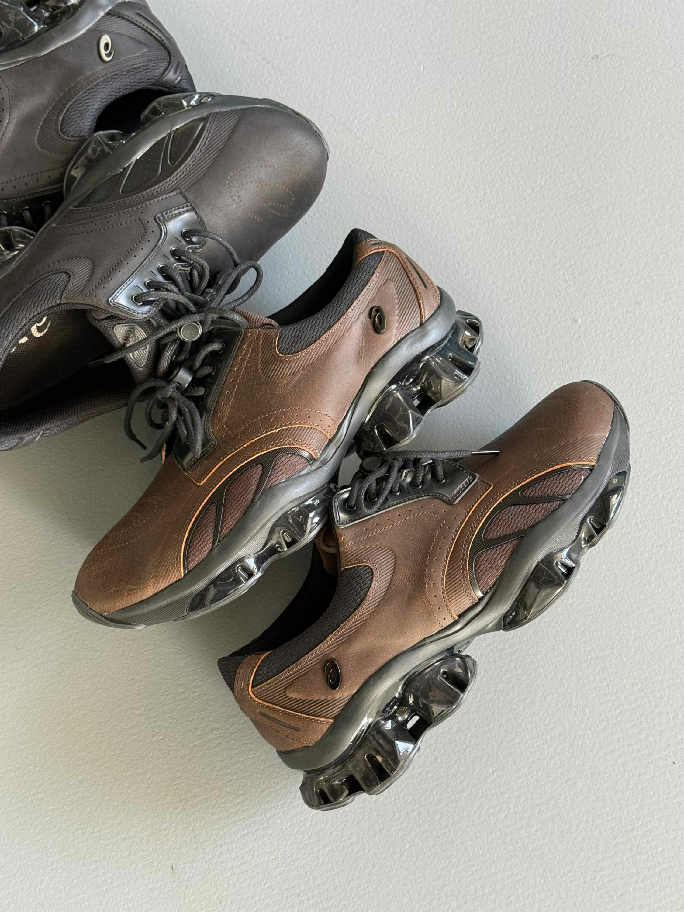 asics first leather gel sneaker sportswear in black and brown
