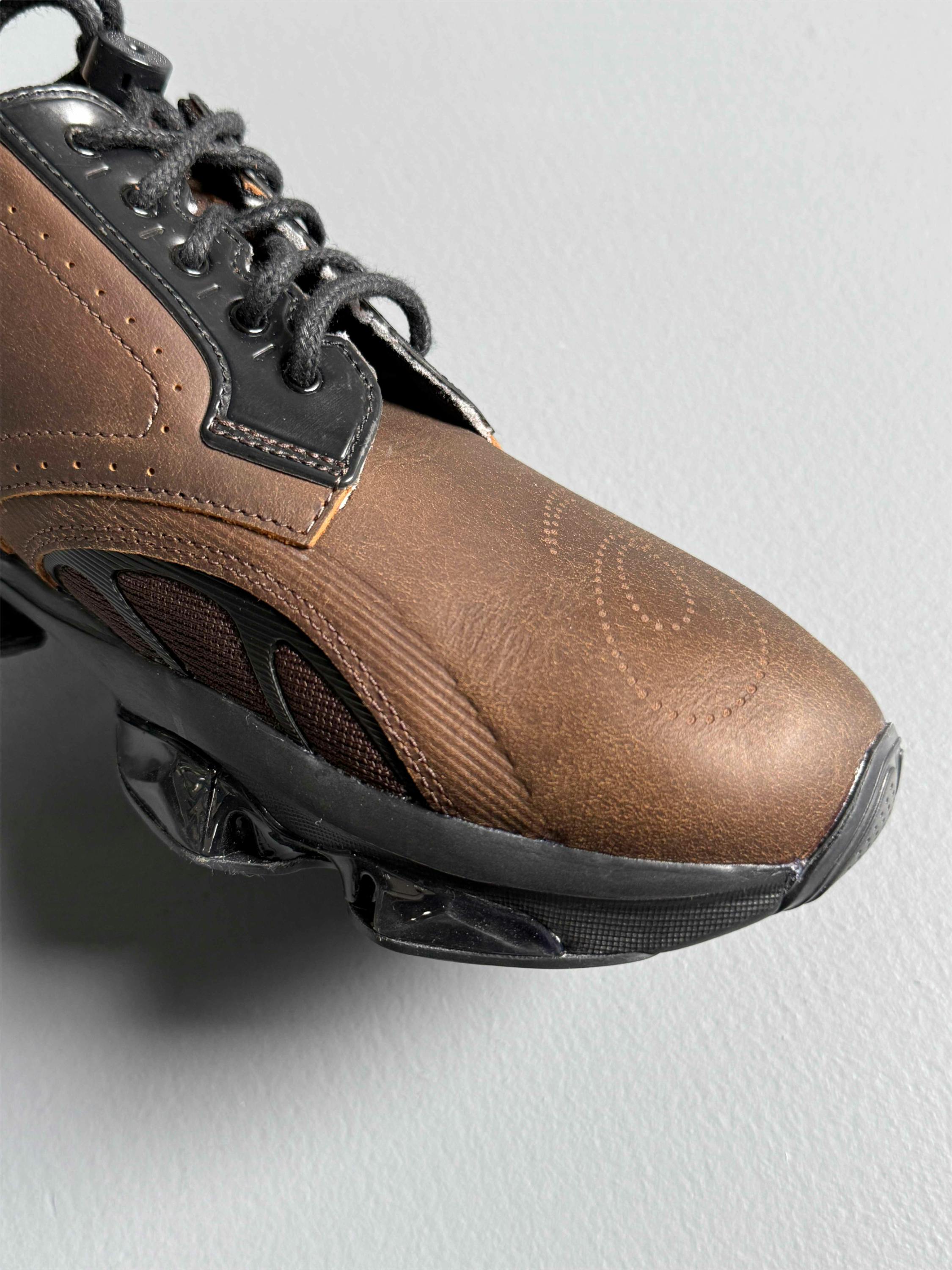 asics first leather gel sneaker sportswear in black and brown