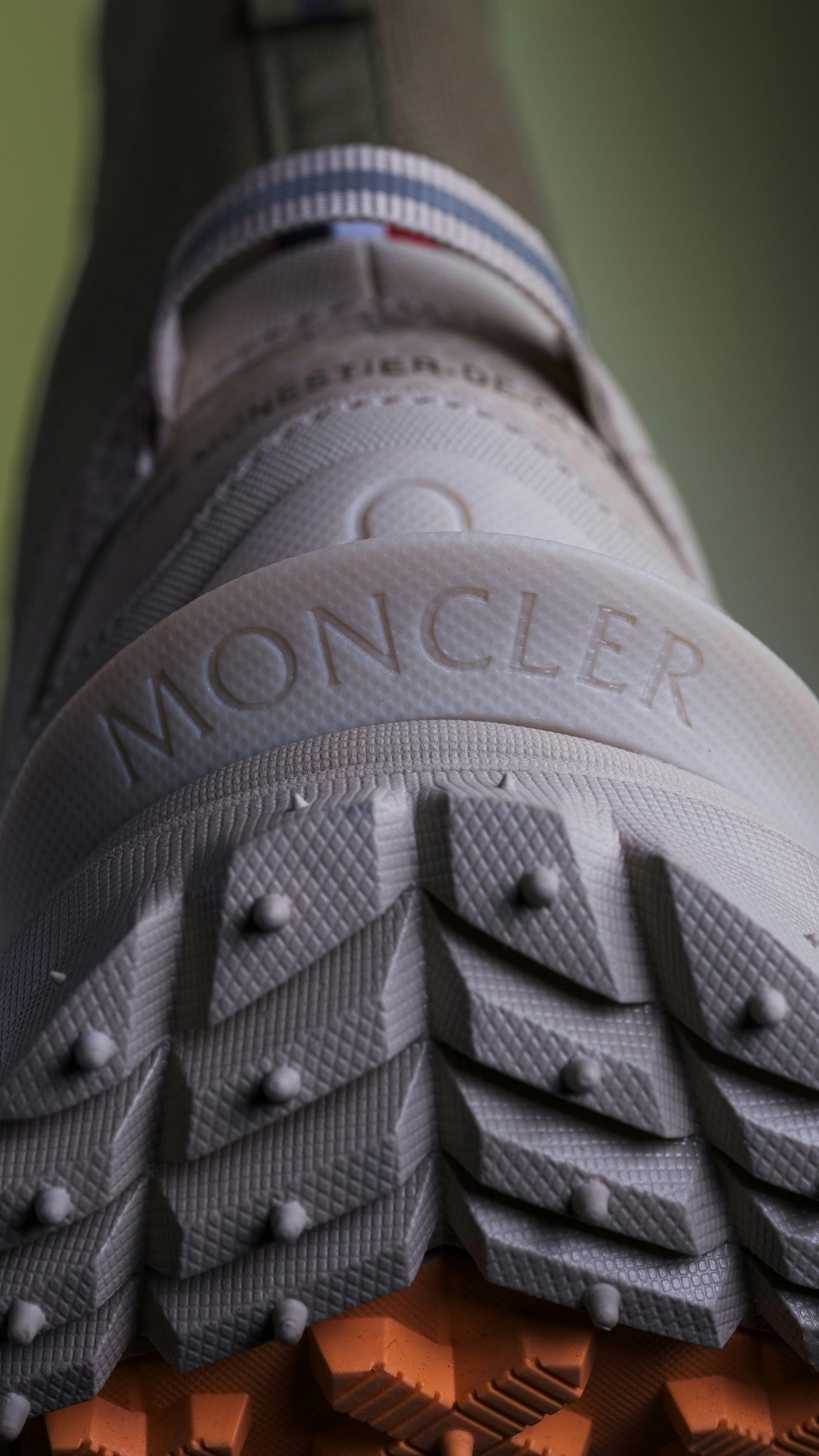 Stylized photographs of Moncler's Fall/Winter 2023 footwear collection