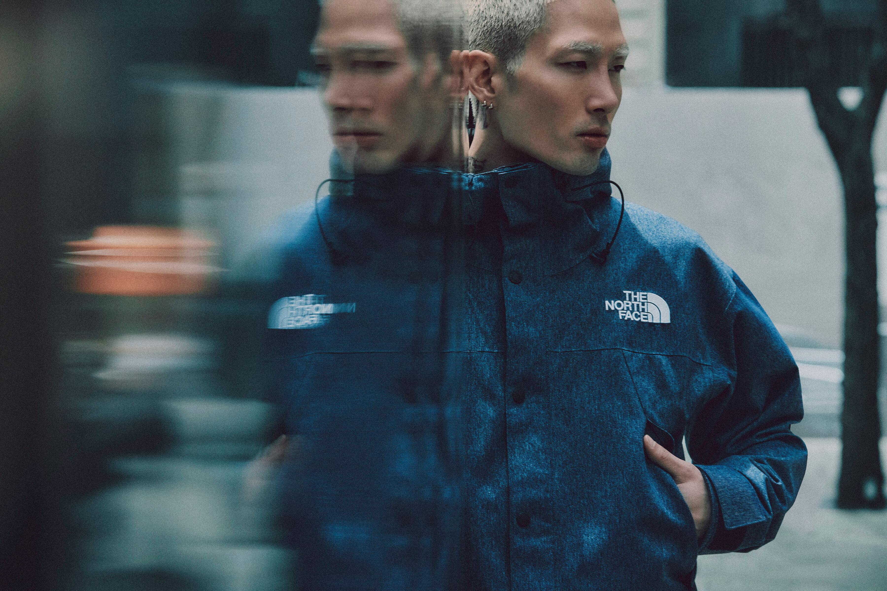 Models wear The North Face's denim GORE-TEX clothing capsule, comprising indigo-dyed jackets, pants, and accessories.