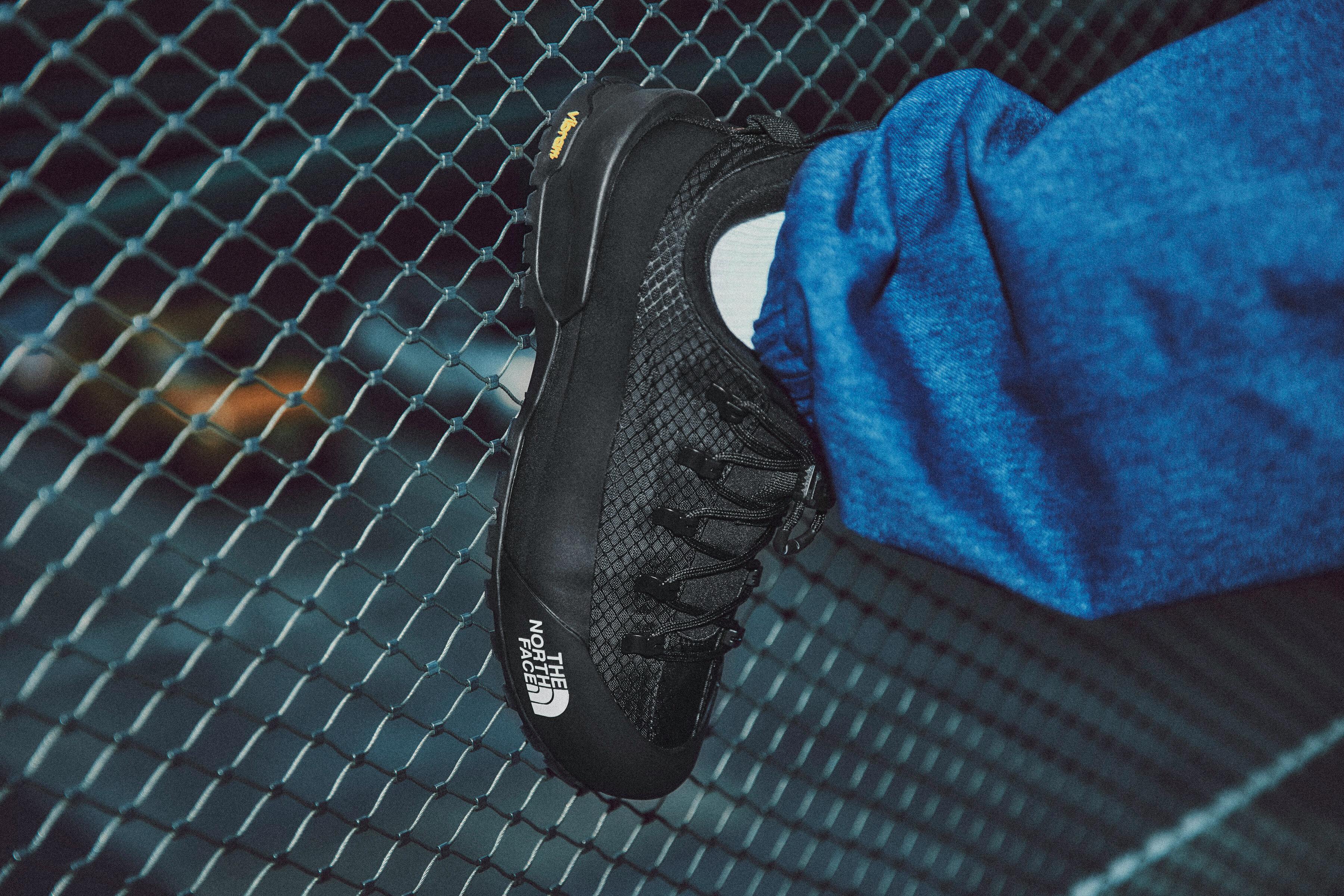 Models wear The North Face's denim GORE-TEX clothing capsule, comprising indigo-dyed jackets, pants, and accessories.