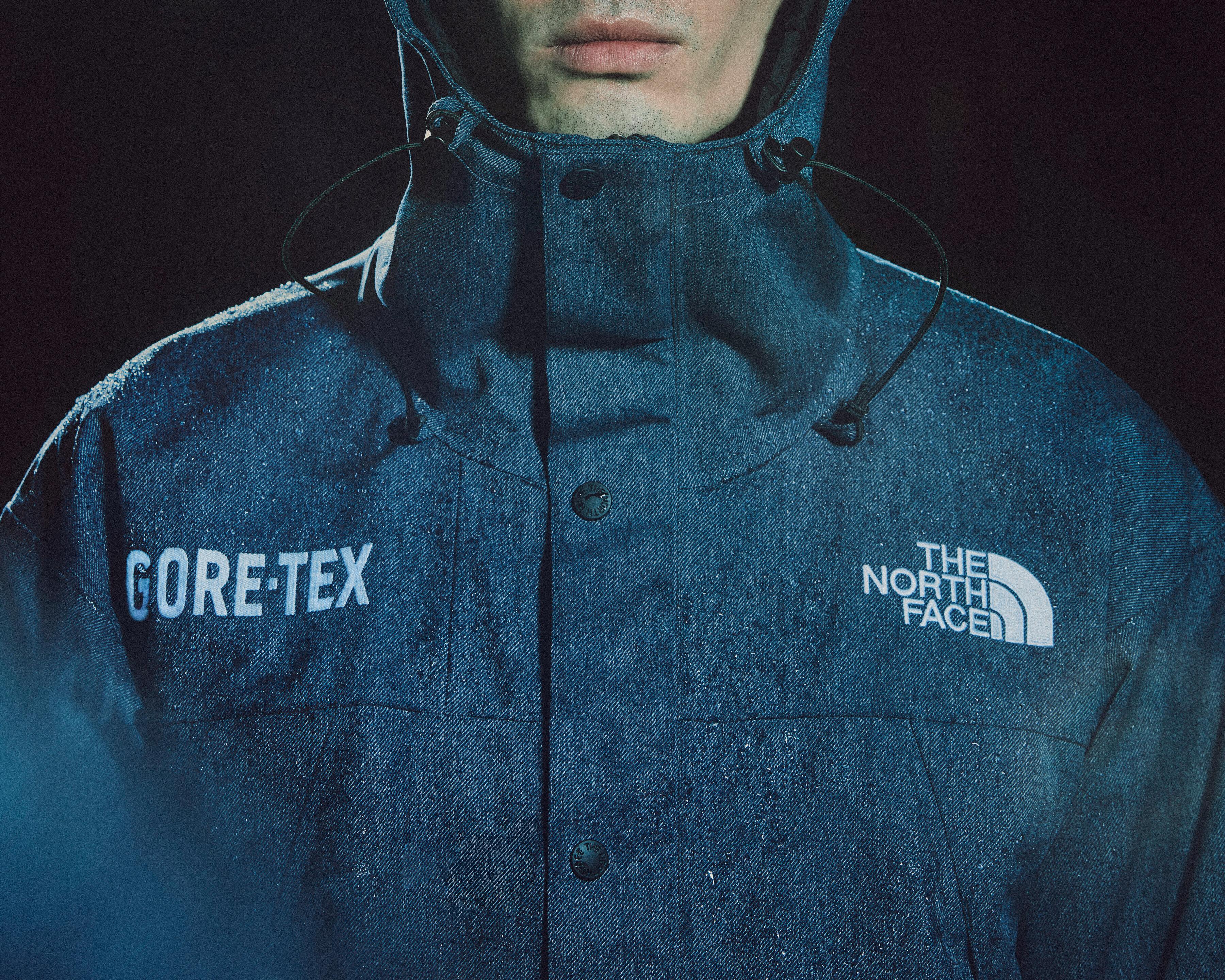 Models wear The North Face's denim GORE-TEX clothing capsule, comprising indigo-dyed jackets, pants, and accessories.