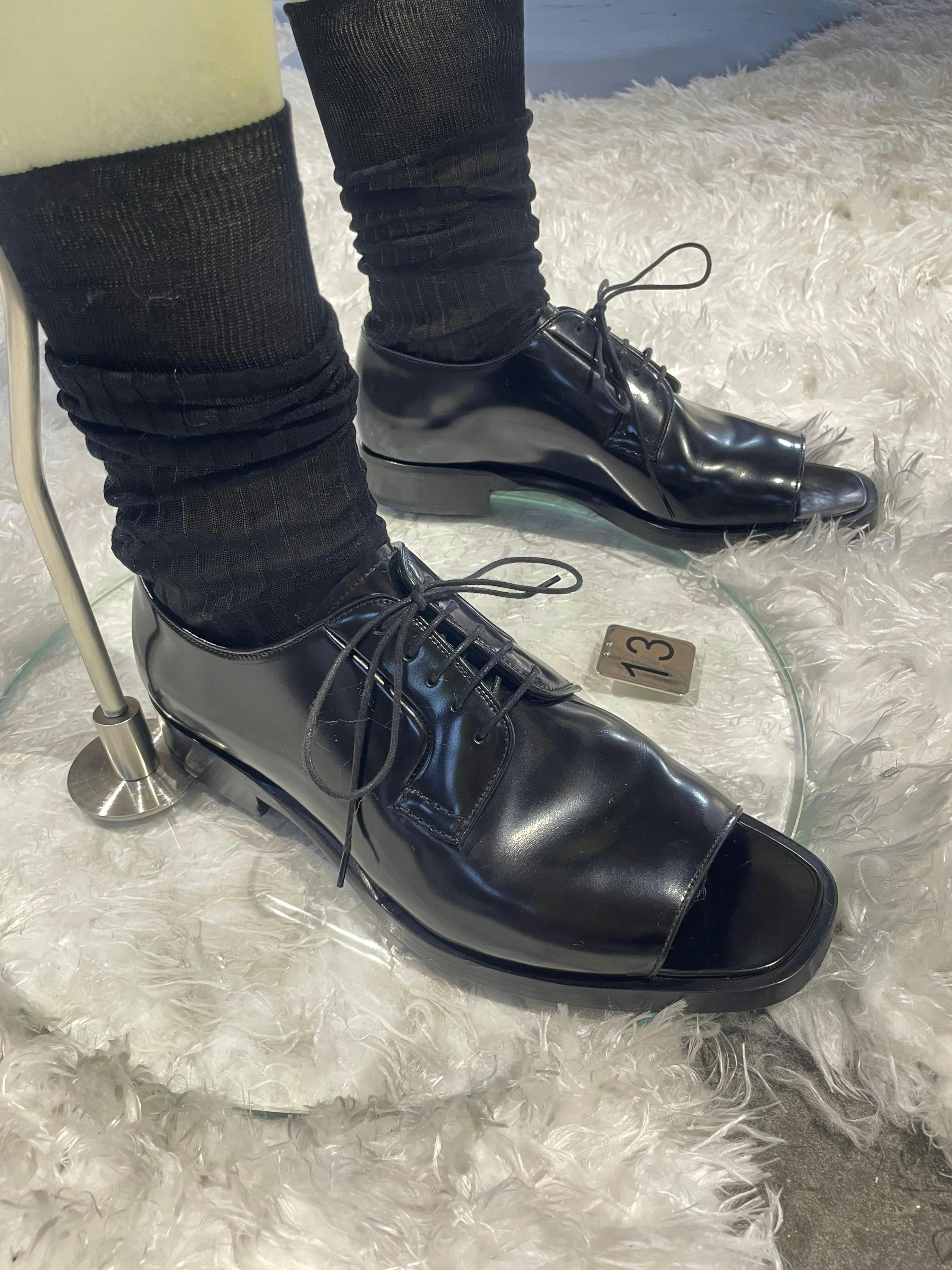 prada ss26 menswear collection showroom