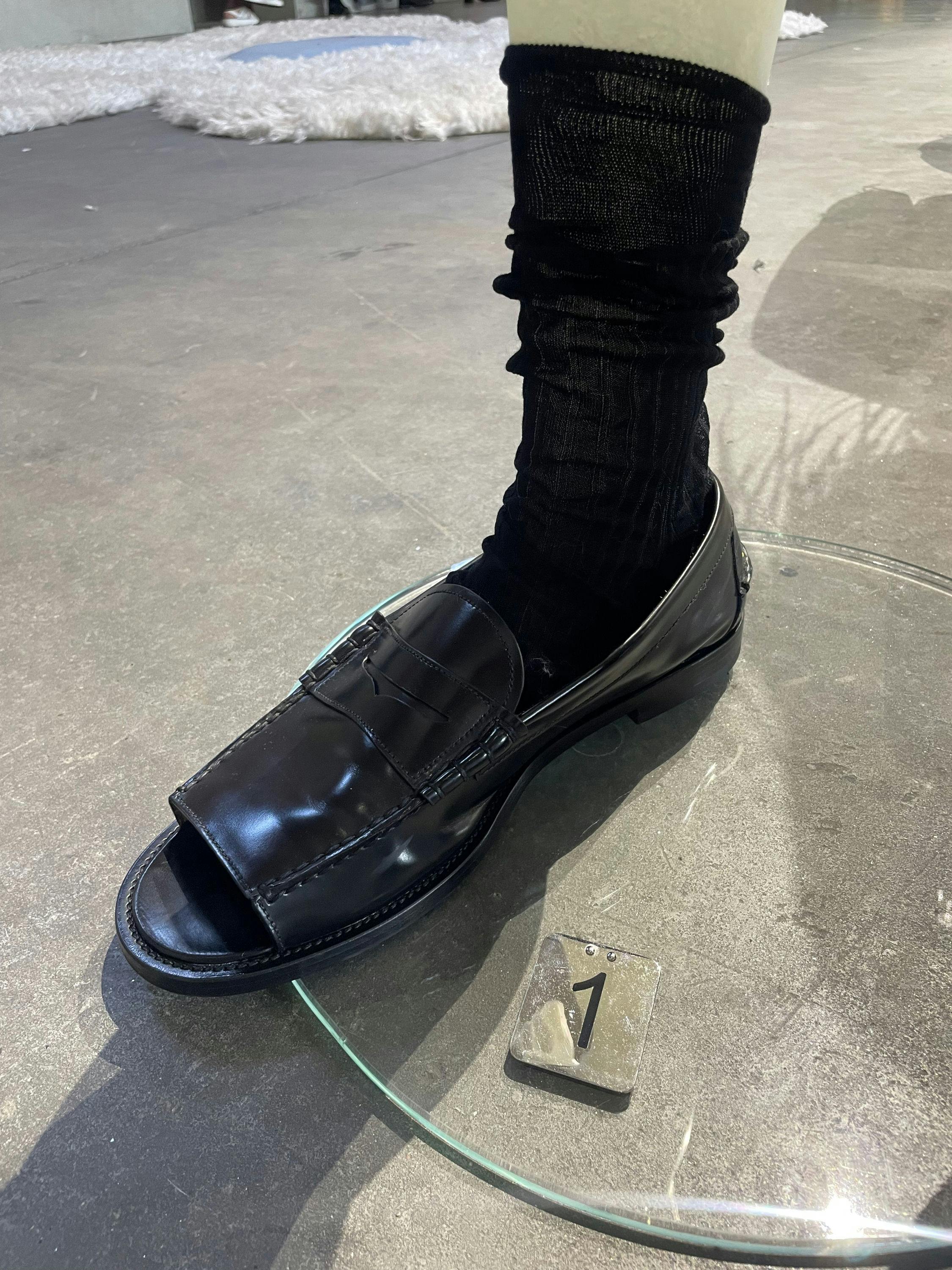 prada ss26 menswear collection showroom