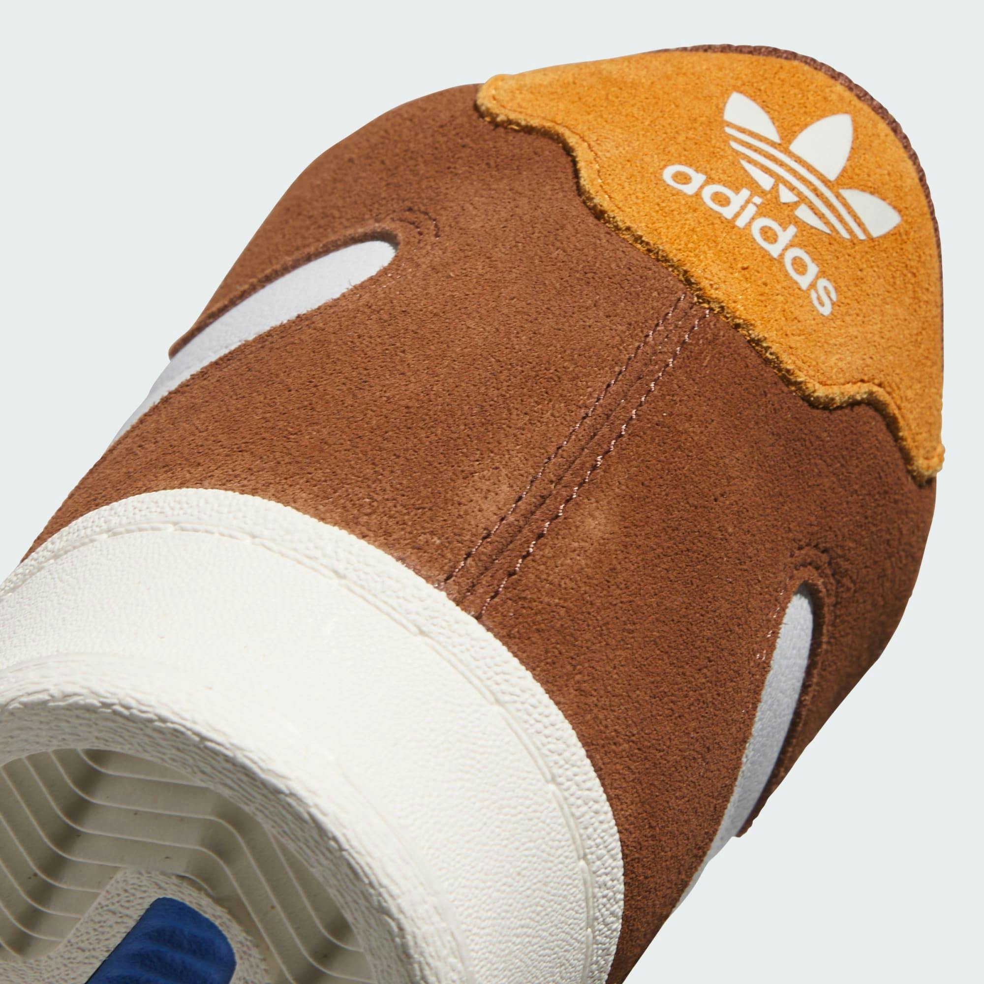 brown and orange adidas superskate sneaker