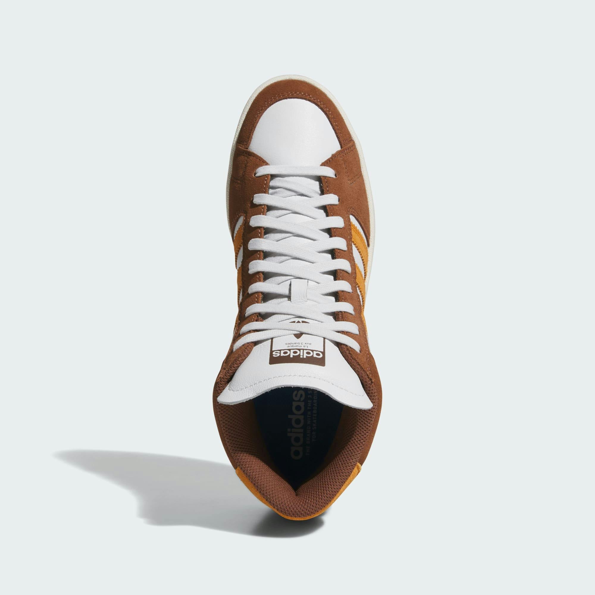brown and orange adidas superskate sneaker
