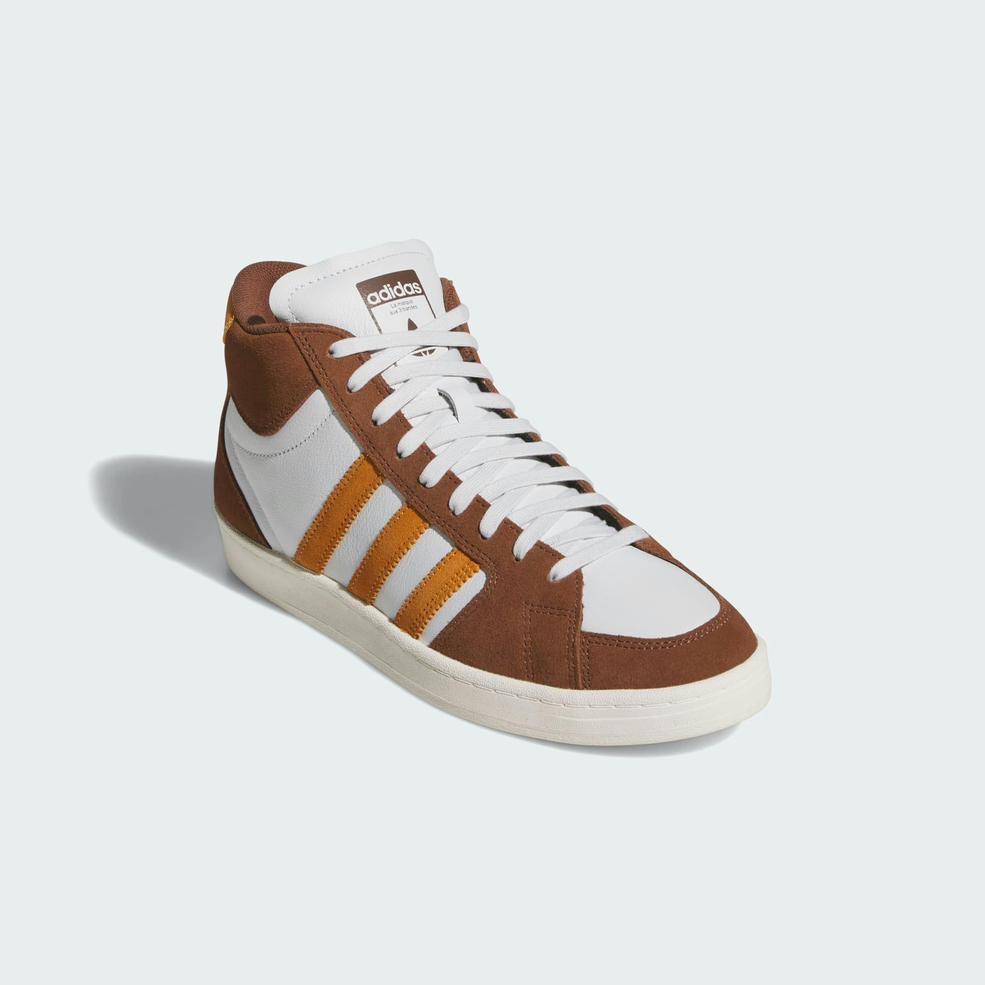 brown and orange adidas superskate sneaker