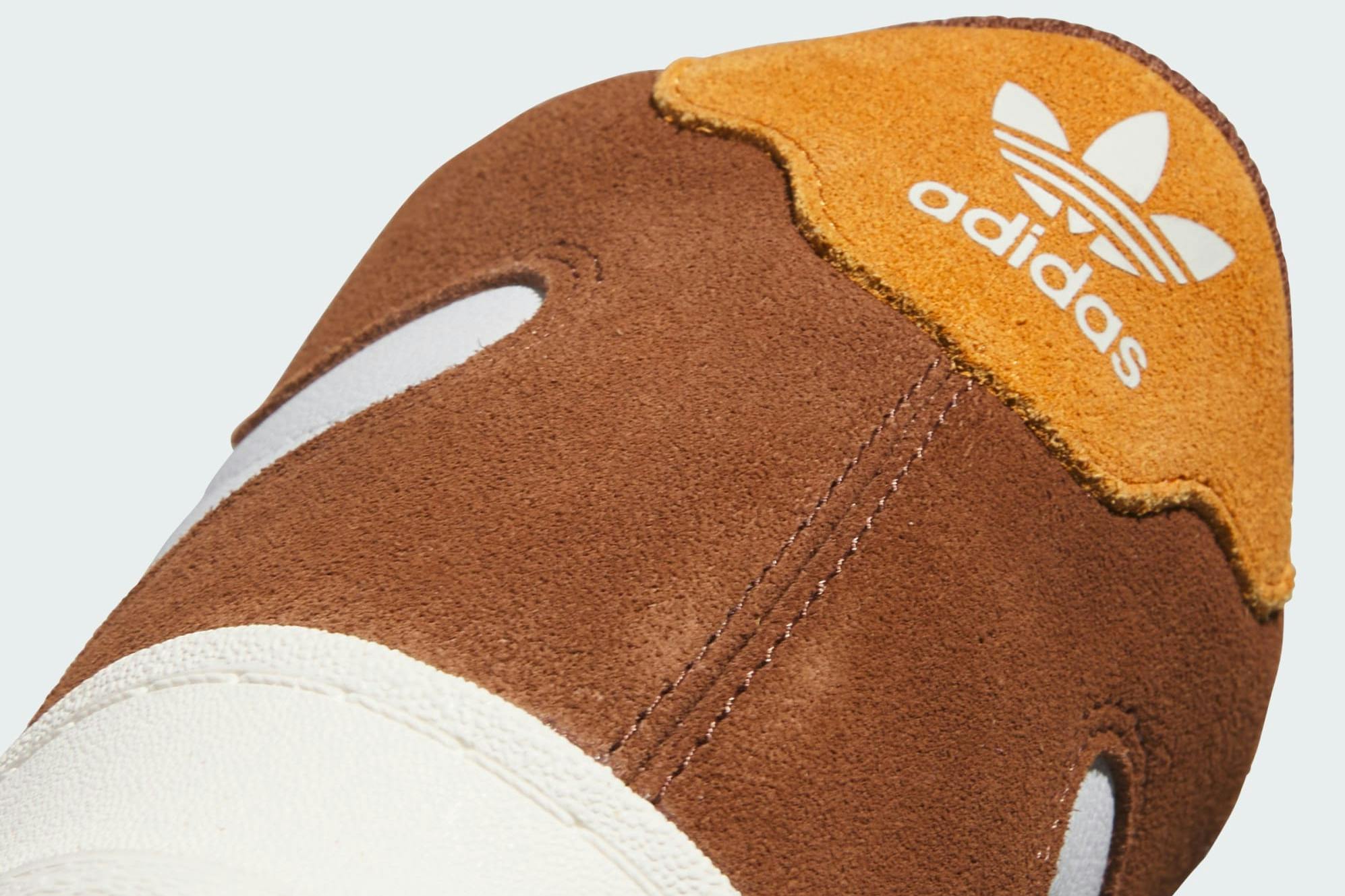 brown and orange adidas superskate sneaker