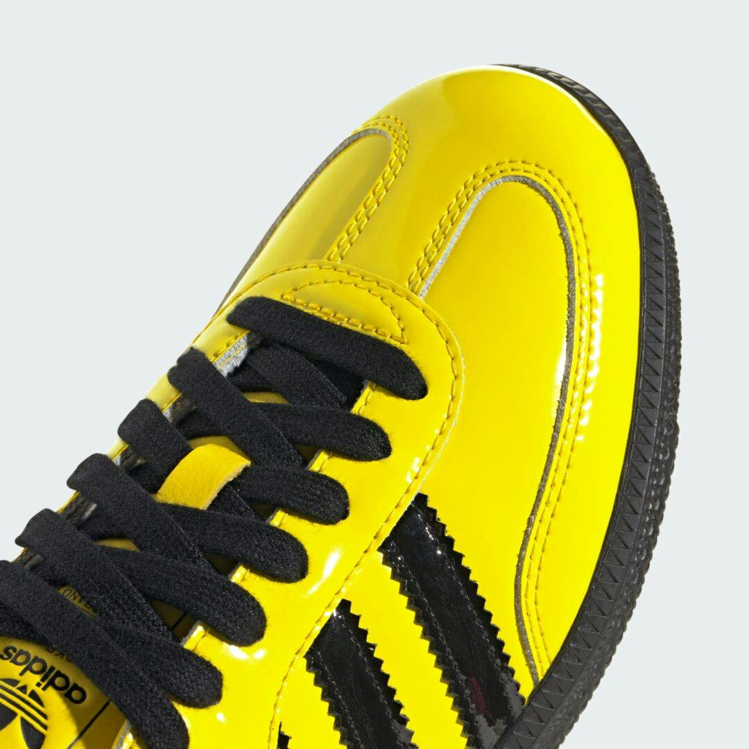 adidas bruce lee samba sneaker in black and yellow leather