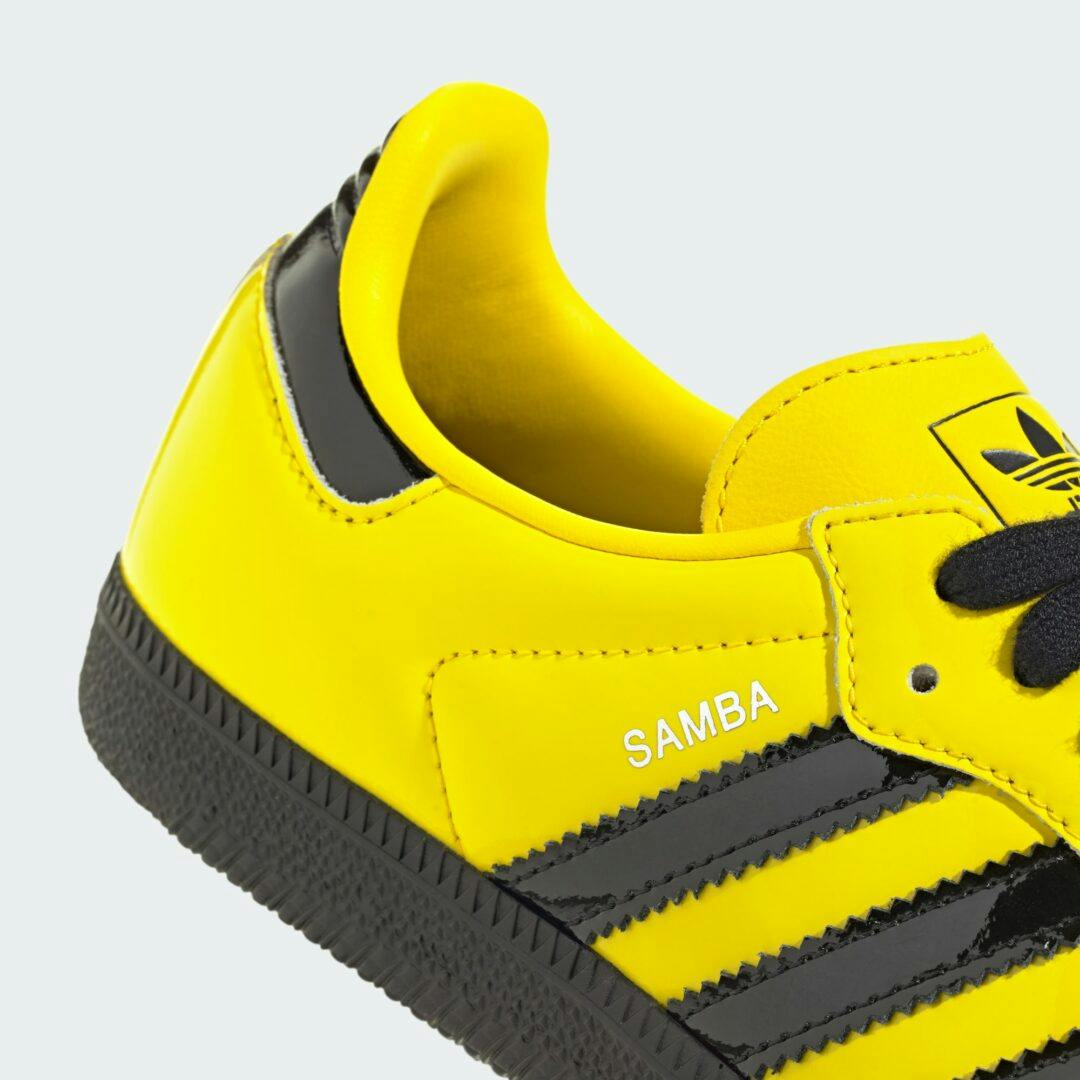 adidas bruce lee samba sneaker in black and yellow leather