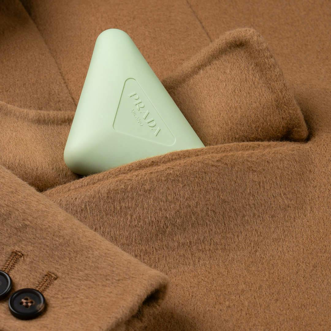 Green triangular Prada hand lotion