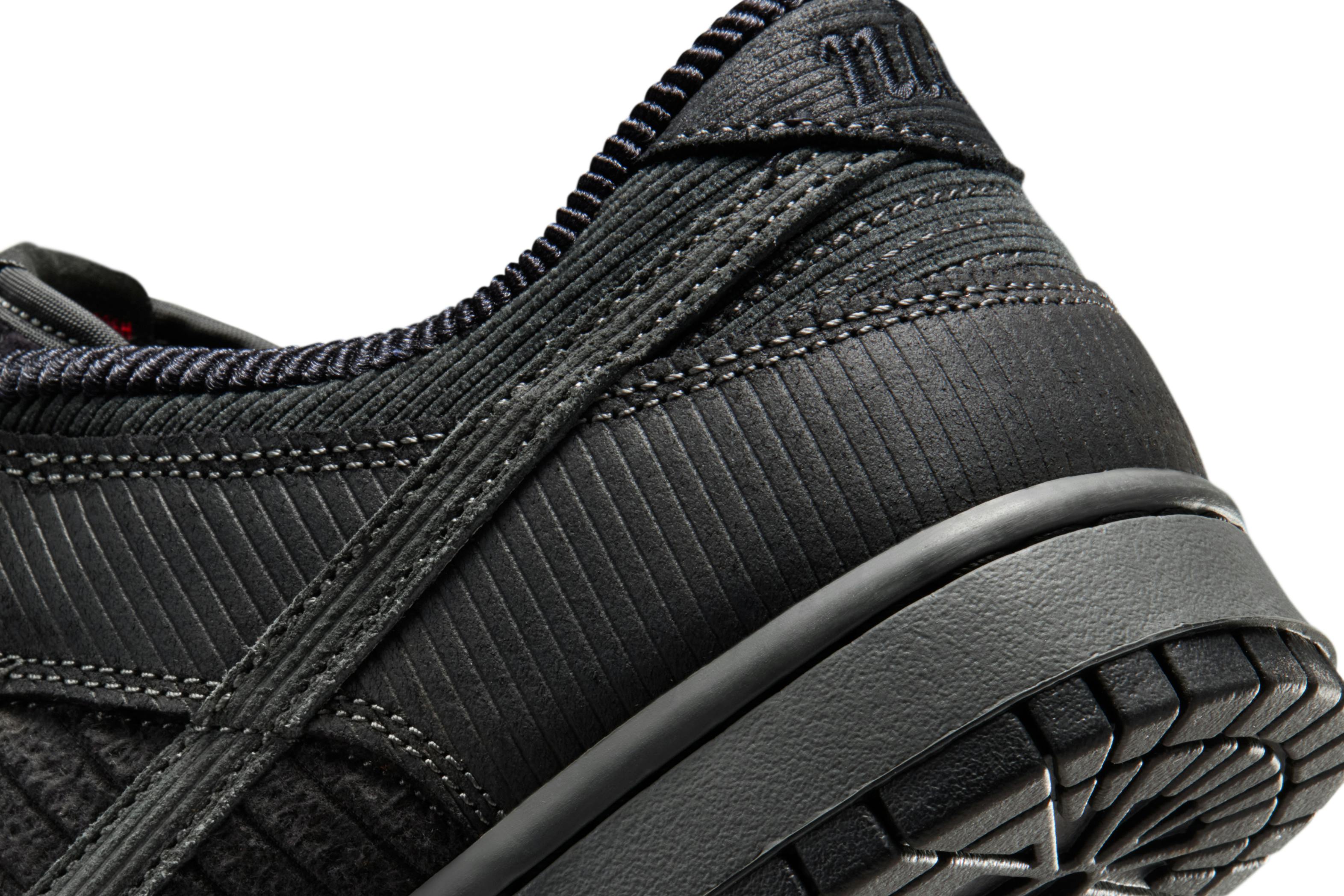 nike dunk low black corduroy