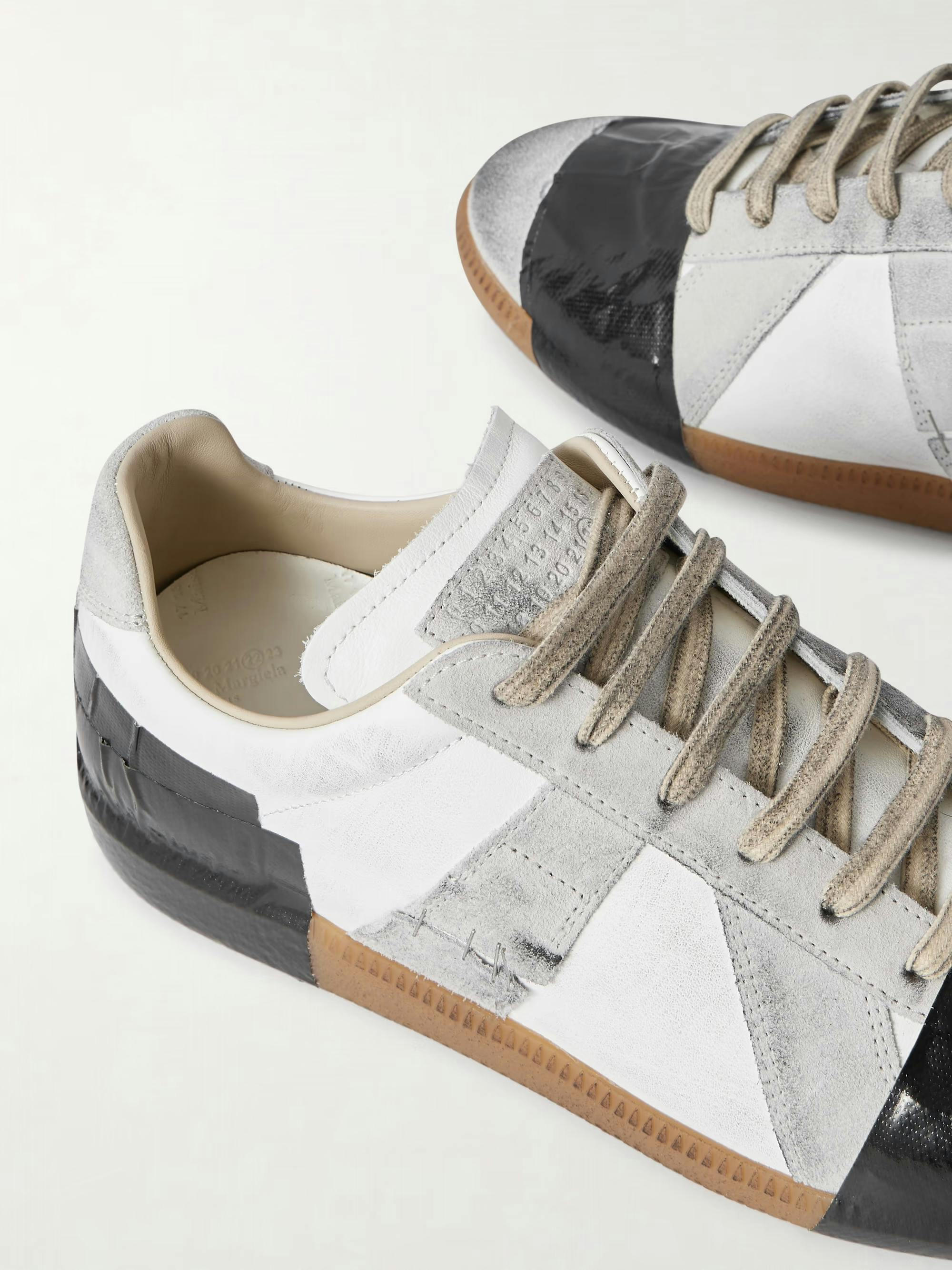 Margiela's Dirty Duct-Taped Replica Sneaker Is $900