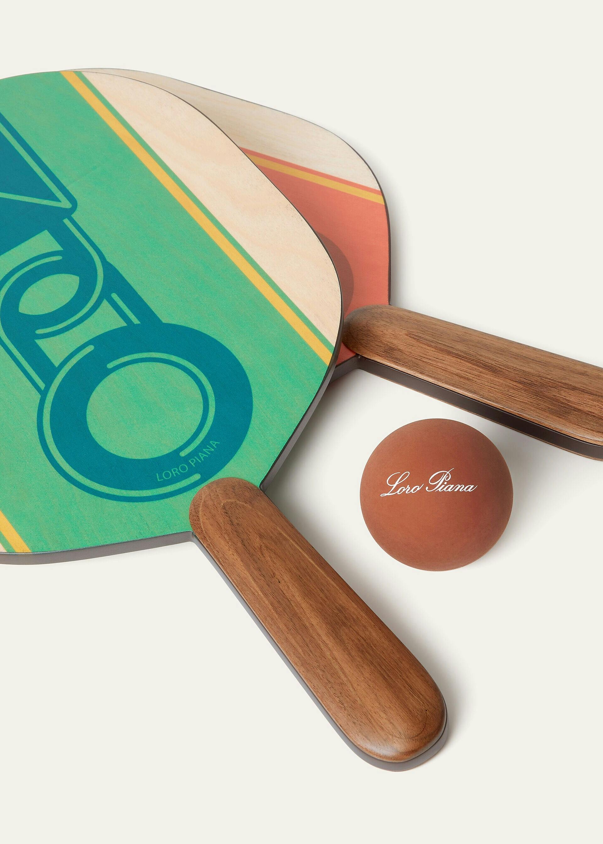 Loro Piana luxury beach racket set on the sand