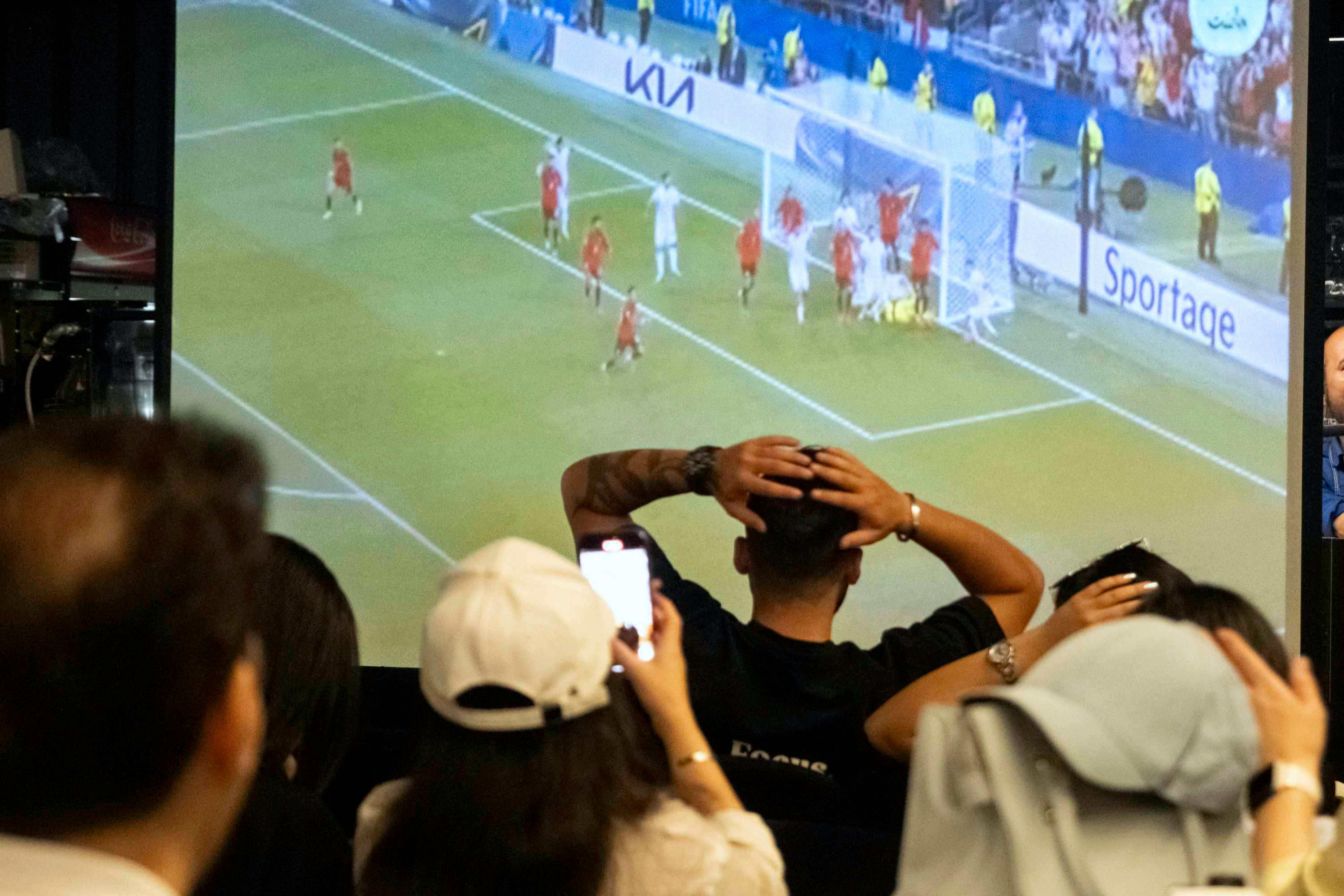 Why Was Everyone Taking Pictures of Their TVs During the World Cup?