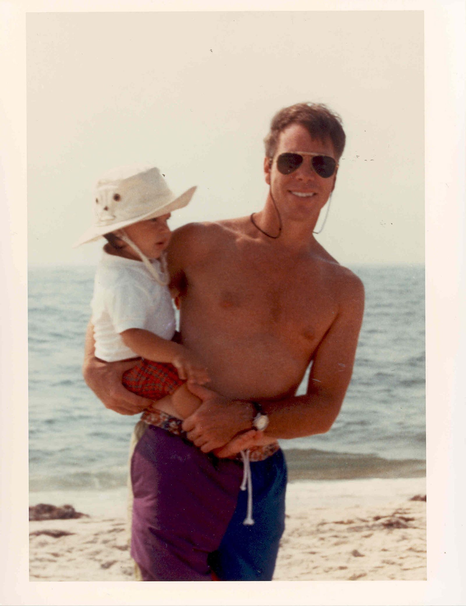  Hilfiger and son Richard in the Hamptons, 1991.