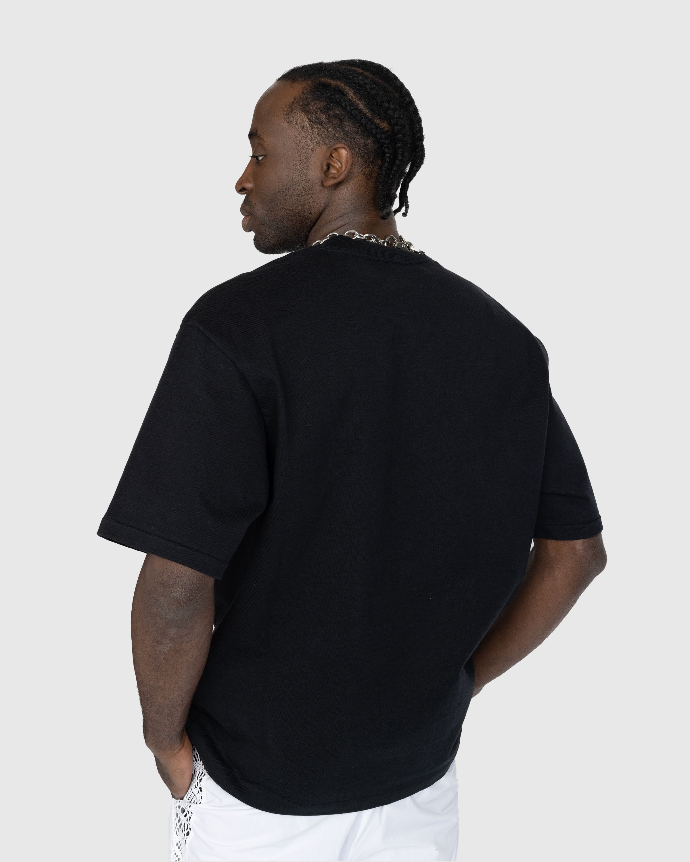 Auralee – Stand-Up Tee Black | Highsnobiety Shop