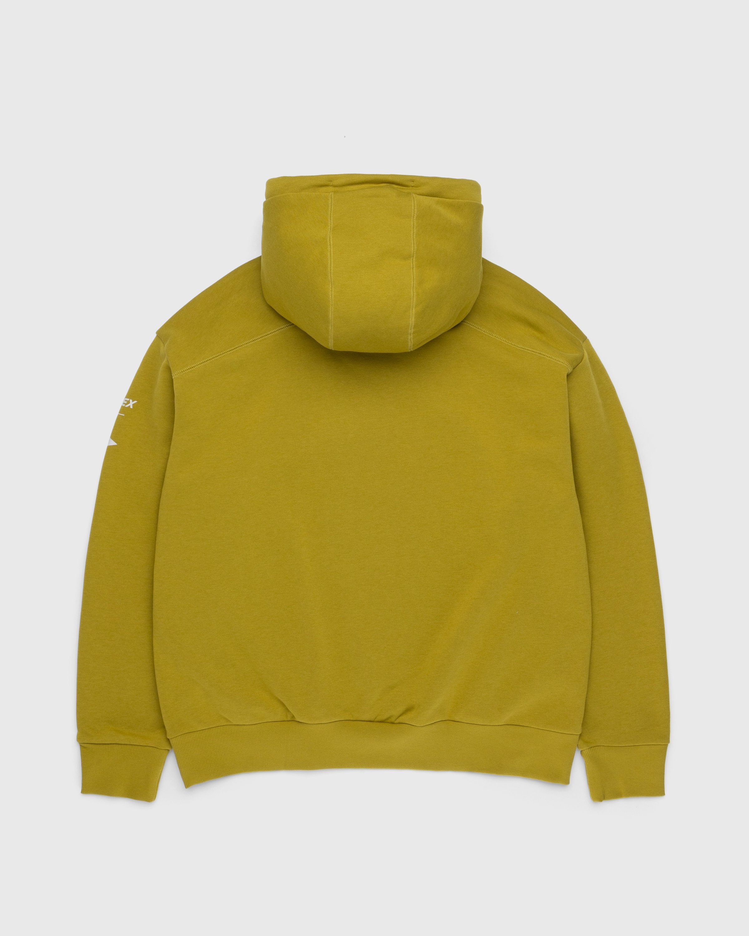 green adidas hoodie with yellow logo