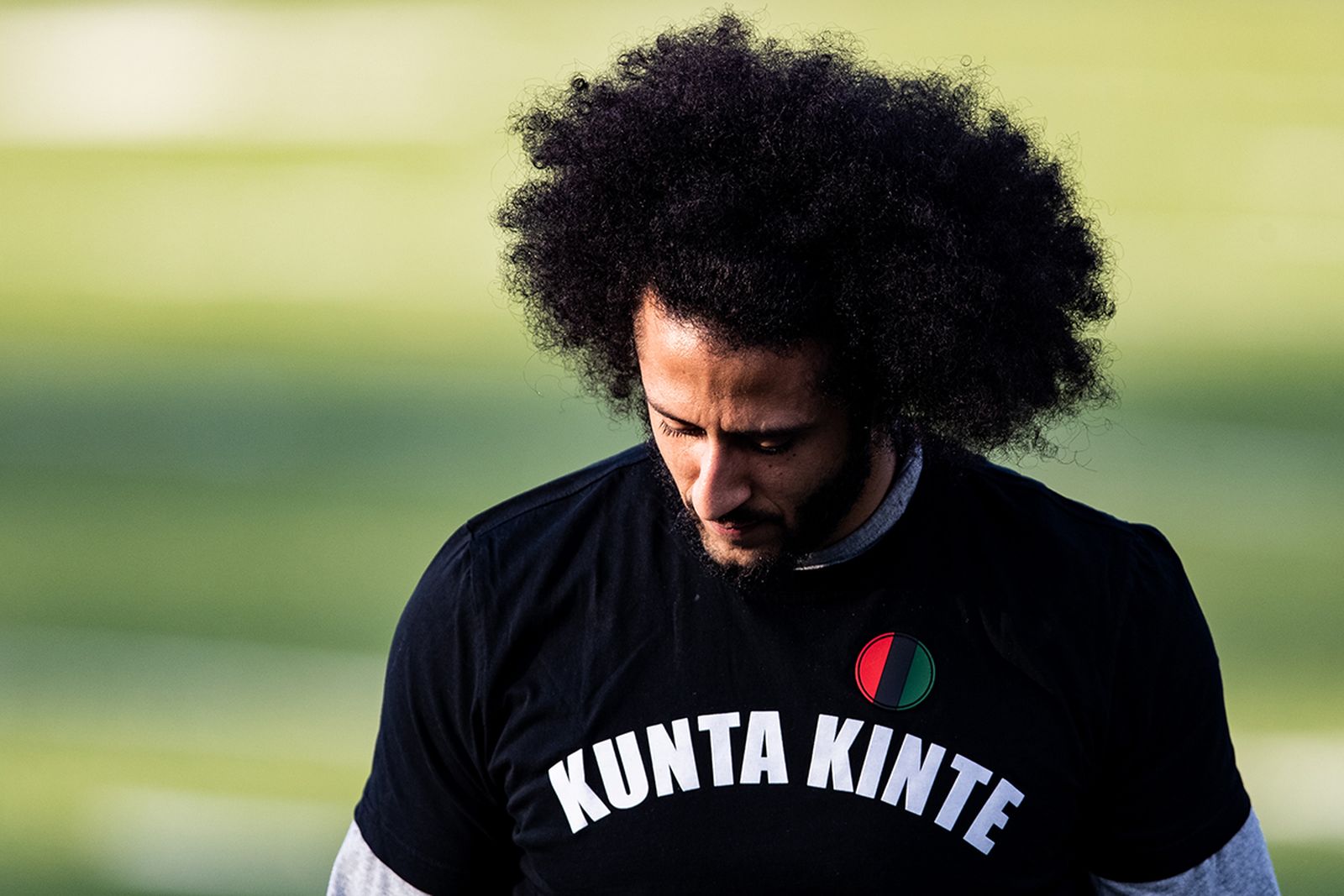Colin Kaepernick looks on during his NFL workout