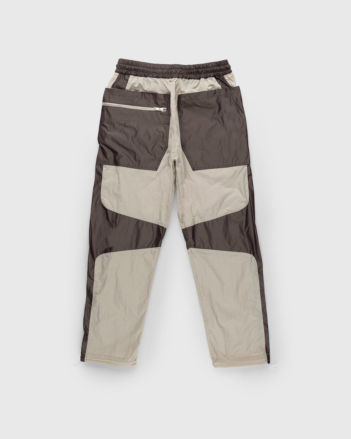 Arnar Mar Jonsson – Contrast Panelled Track Trouser Beige Chocolate - Pants - Brown - Image 1