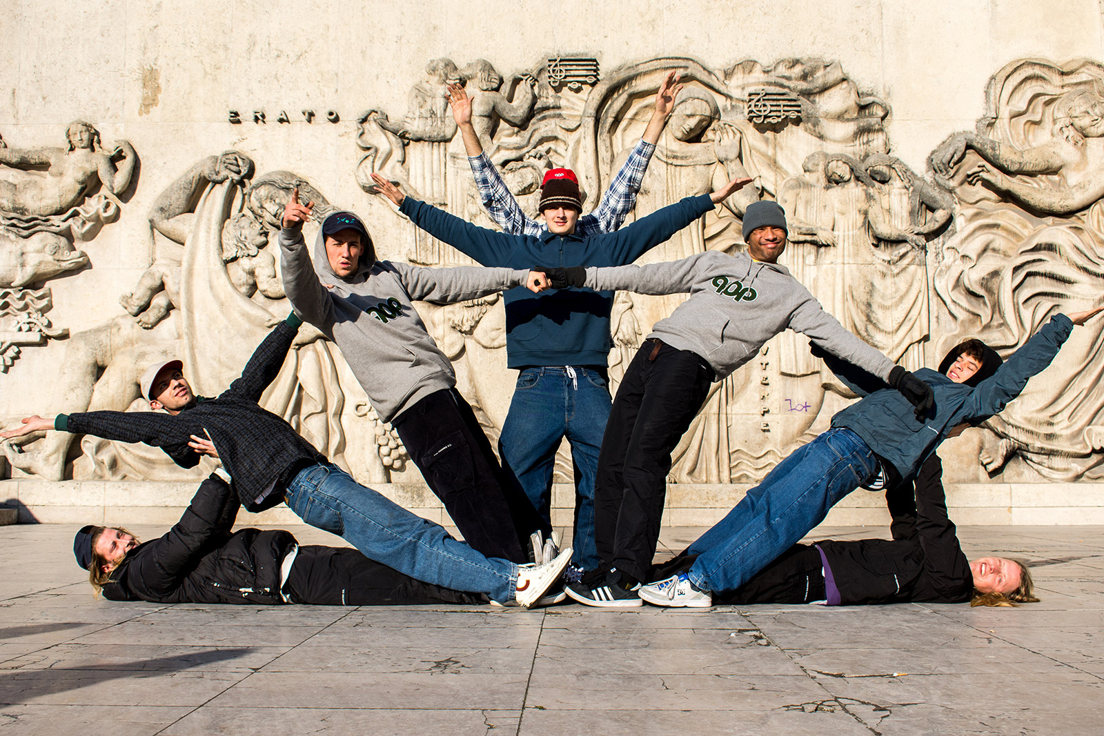 Pop Trading Company’s riders forming a human tower on a skate trip to Paris.