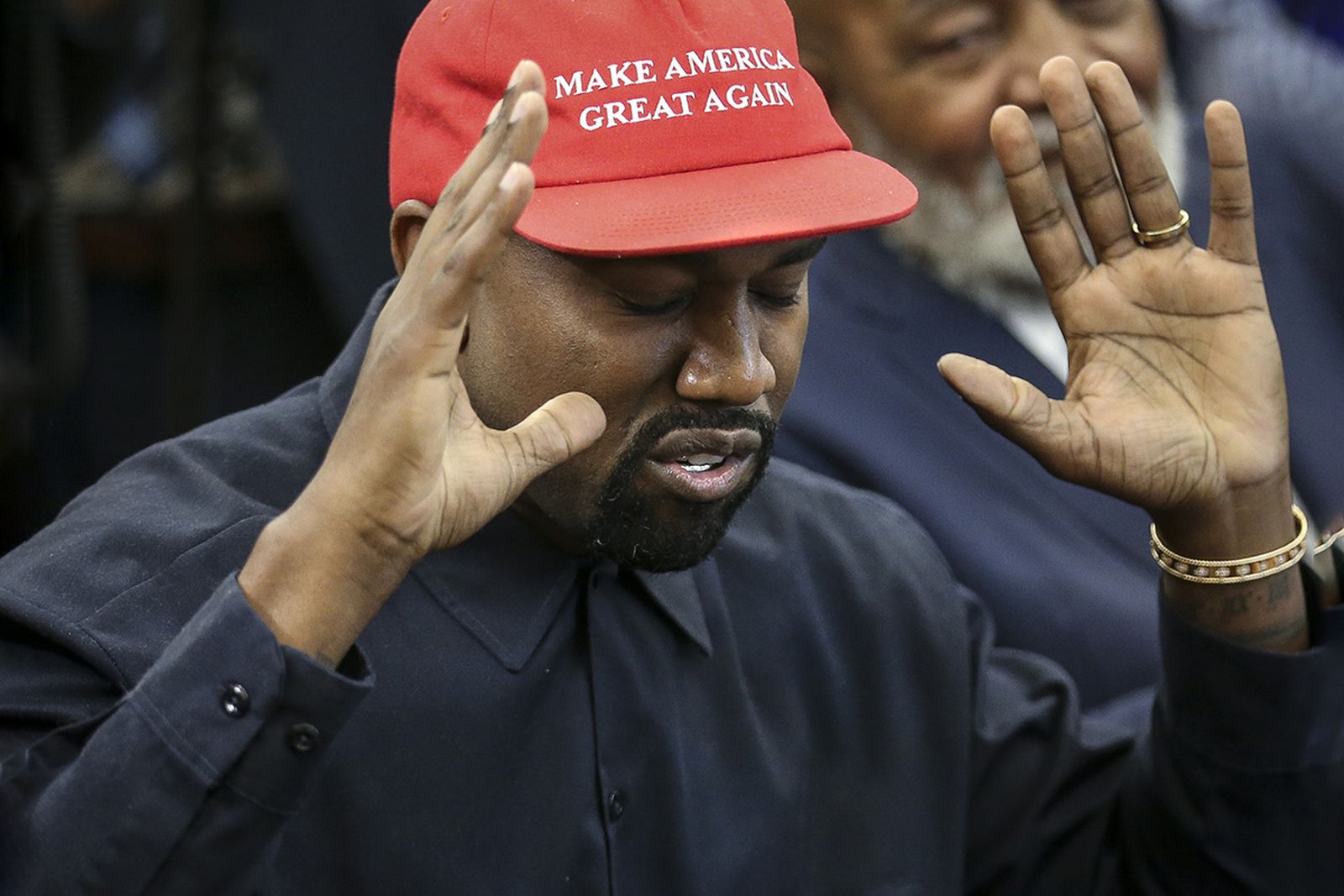 Kanye West speaks during a meeting with U.S. President Donald Trump in the Oval office
