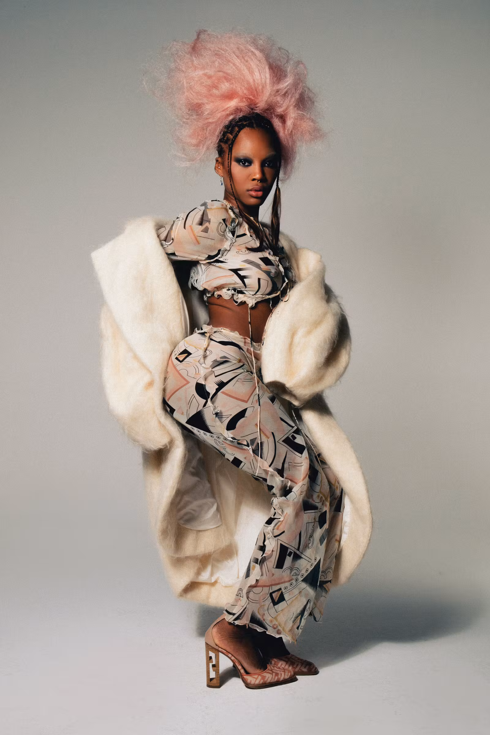 Top, pants, and shoes FENDI Coat KRISTINA K
