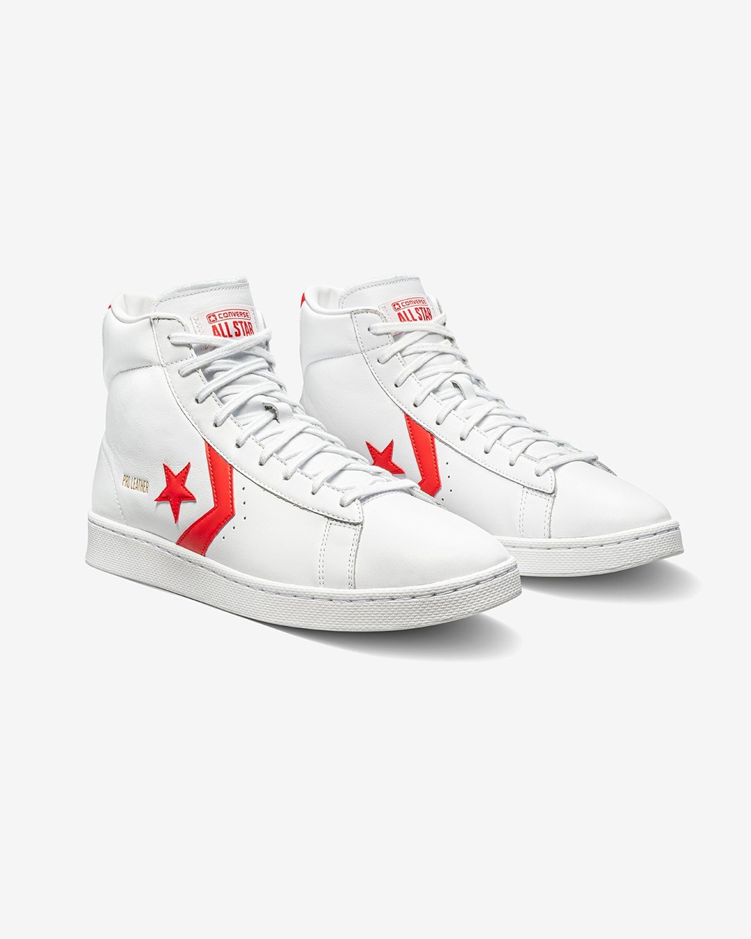 Converse leather hotsell white red