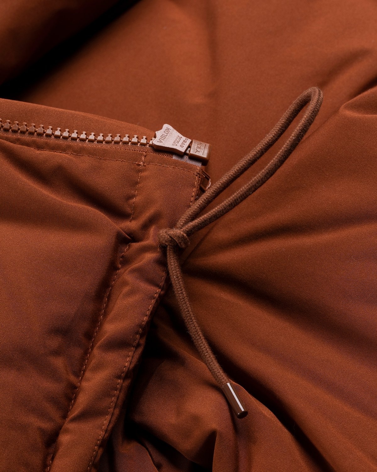 Entire Studios – SOA Puffer Jacket Rust | Highsnobiety Shop