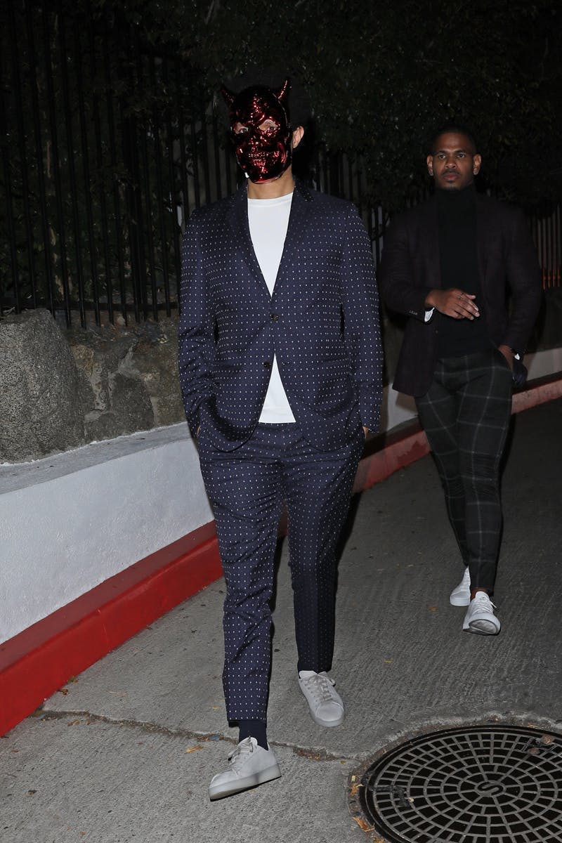 Trevor Noah keeps it simple with just a face mask for Halloween