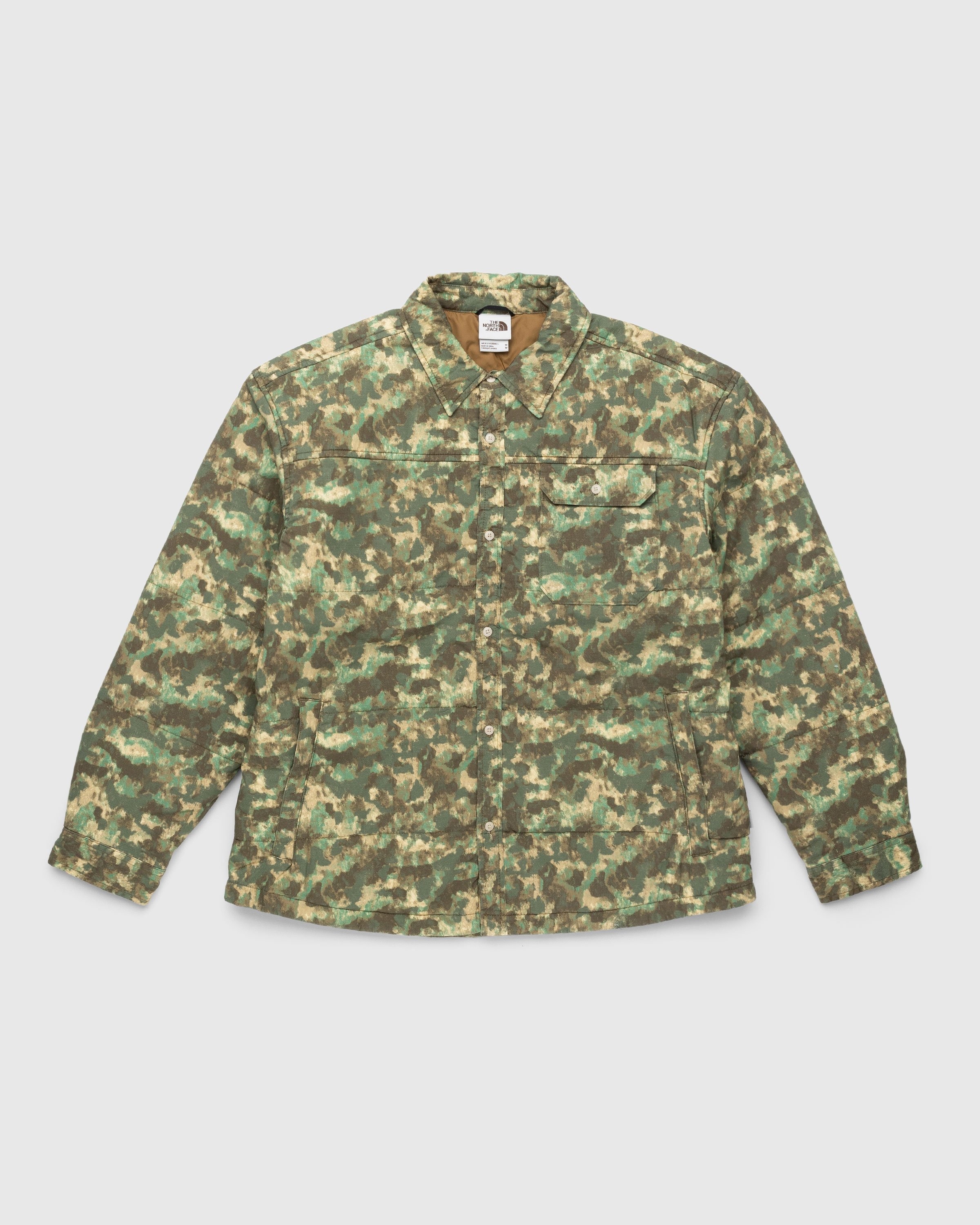 The North Face – M66 Utility Rain Jacket Military Olive/Stippled Camo Print - Outerwear - Green - Image 1
