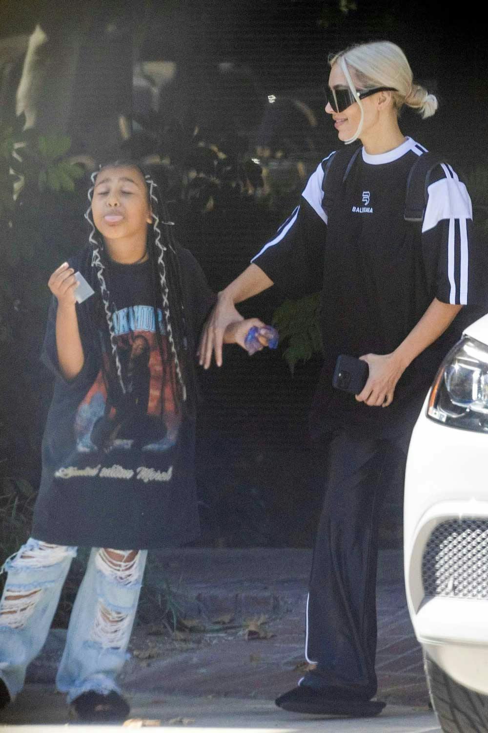 north-west-kim-balenciaga-outfit-2022-face-1