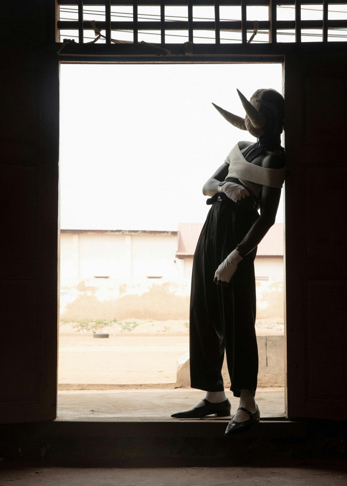 KWABENA Top and belt GMBH Pants YOHJI YAMAMOTO Socks CELINE Shoes MAISON MARGIELA
