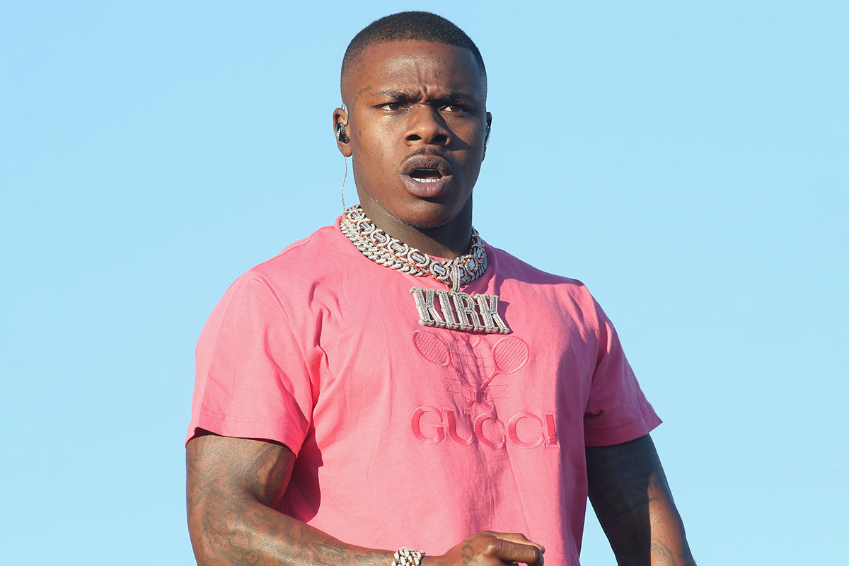 DaBaby performing at Astroworld in pink shirt
